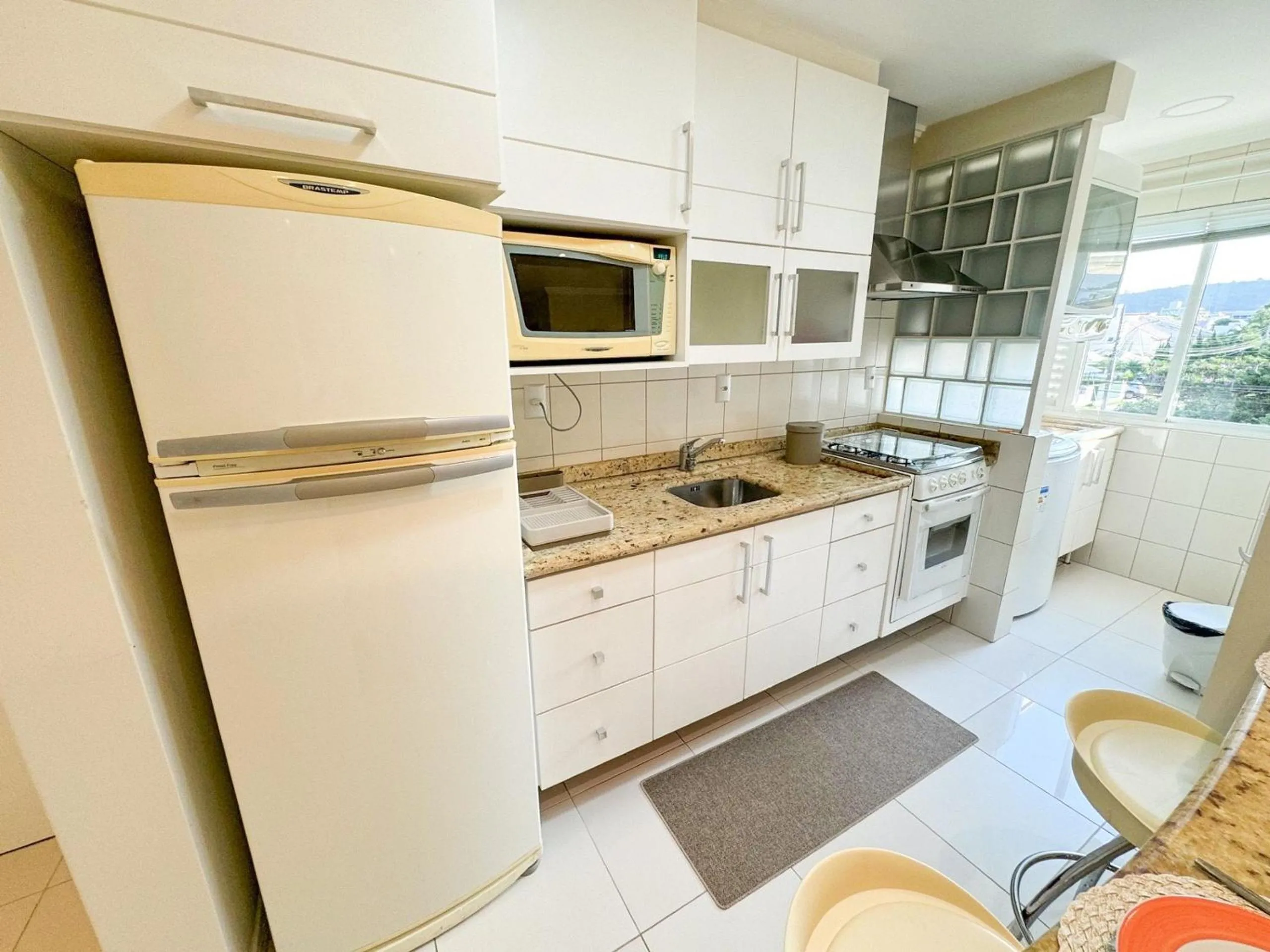 Kitchen or kitchenette in Charme Conforto Jurere Internacional Florianópolis