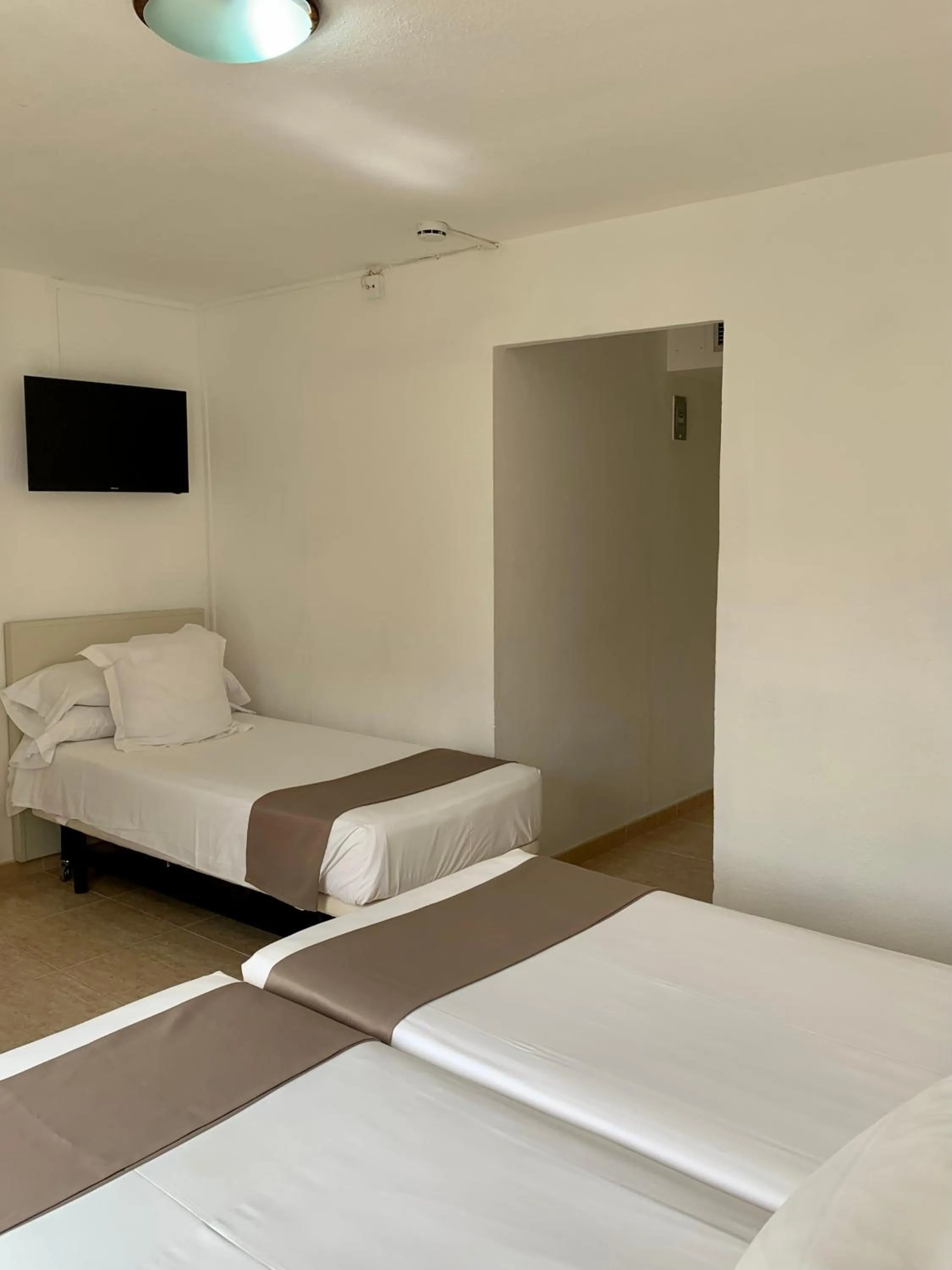 Bed in Hotel Jeni & Restaurant