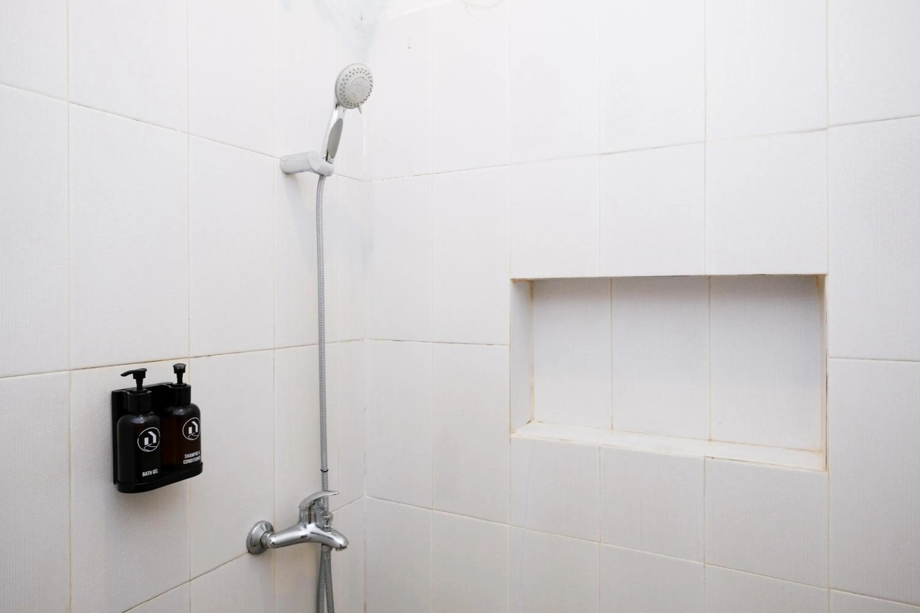 Bathroom in Urbanview Code Riverstay Yogyakarta