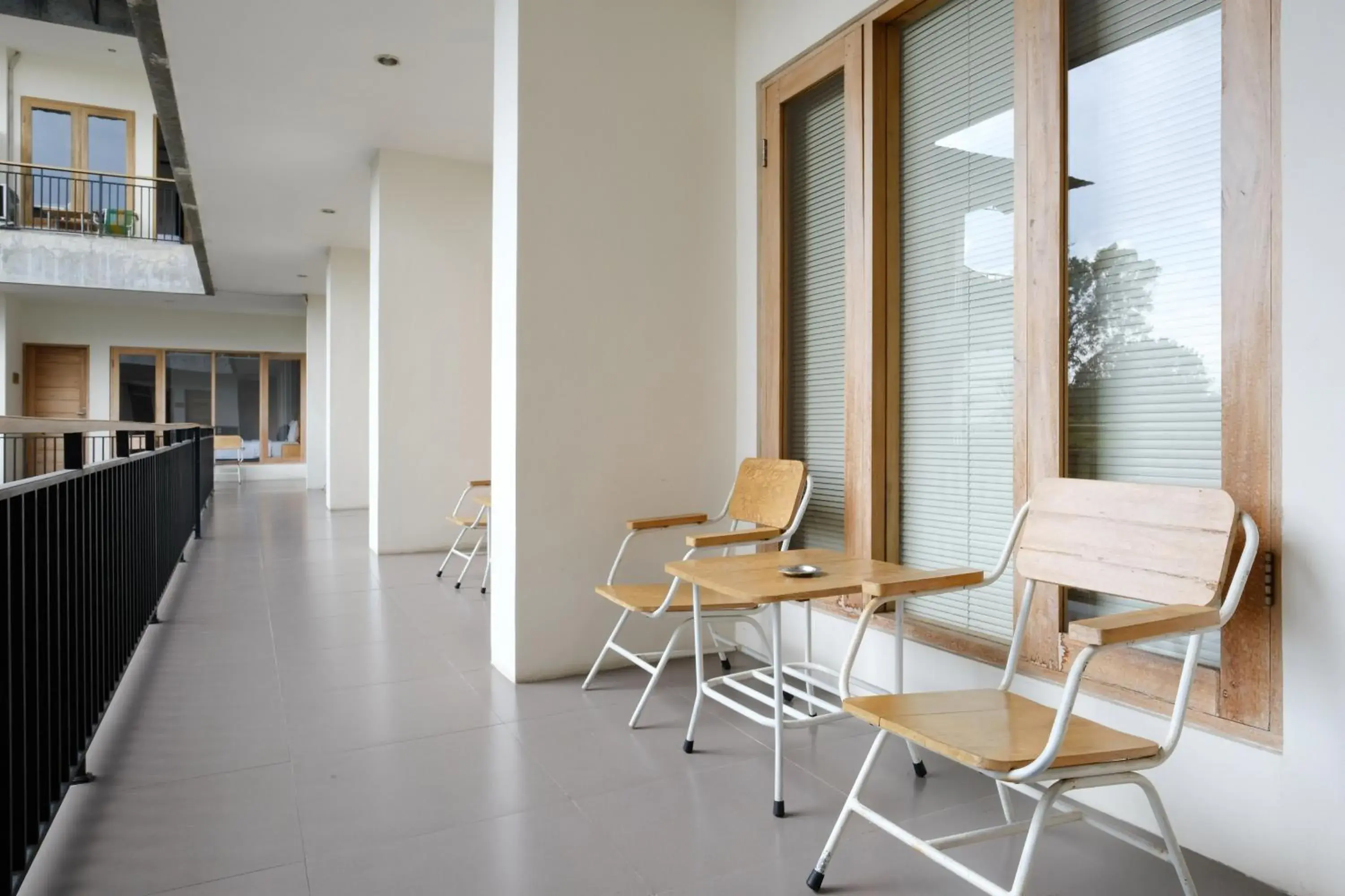 Seating area in Urbanview Code Riverstay Yogyakarta Seating area in Urbanview Code Riverstay Yogyakarta