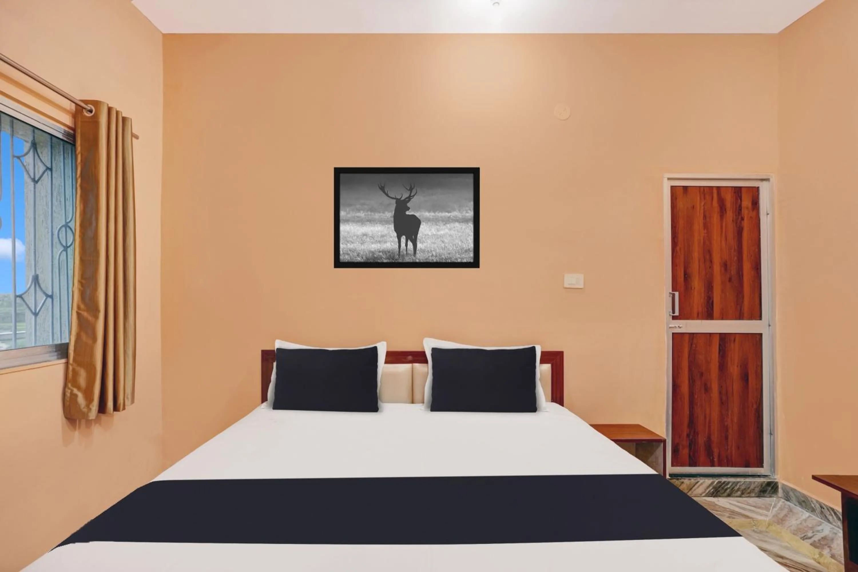Bedroom in Hotel O Mayur Residency
