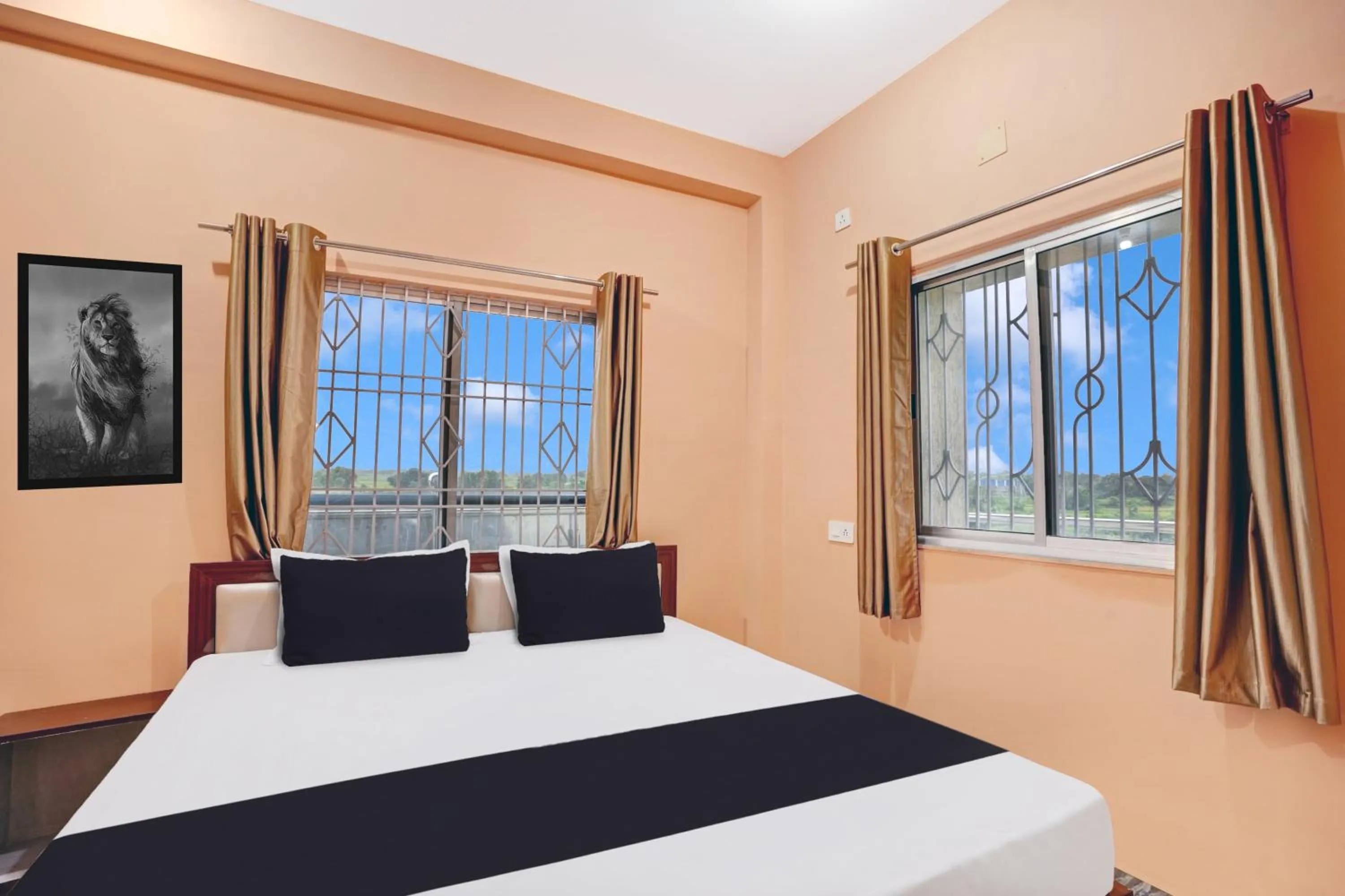 Bedroom in Hotel O Mayur Residency