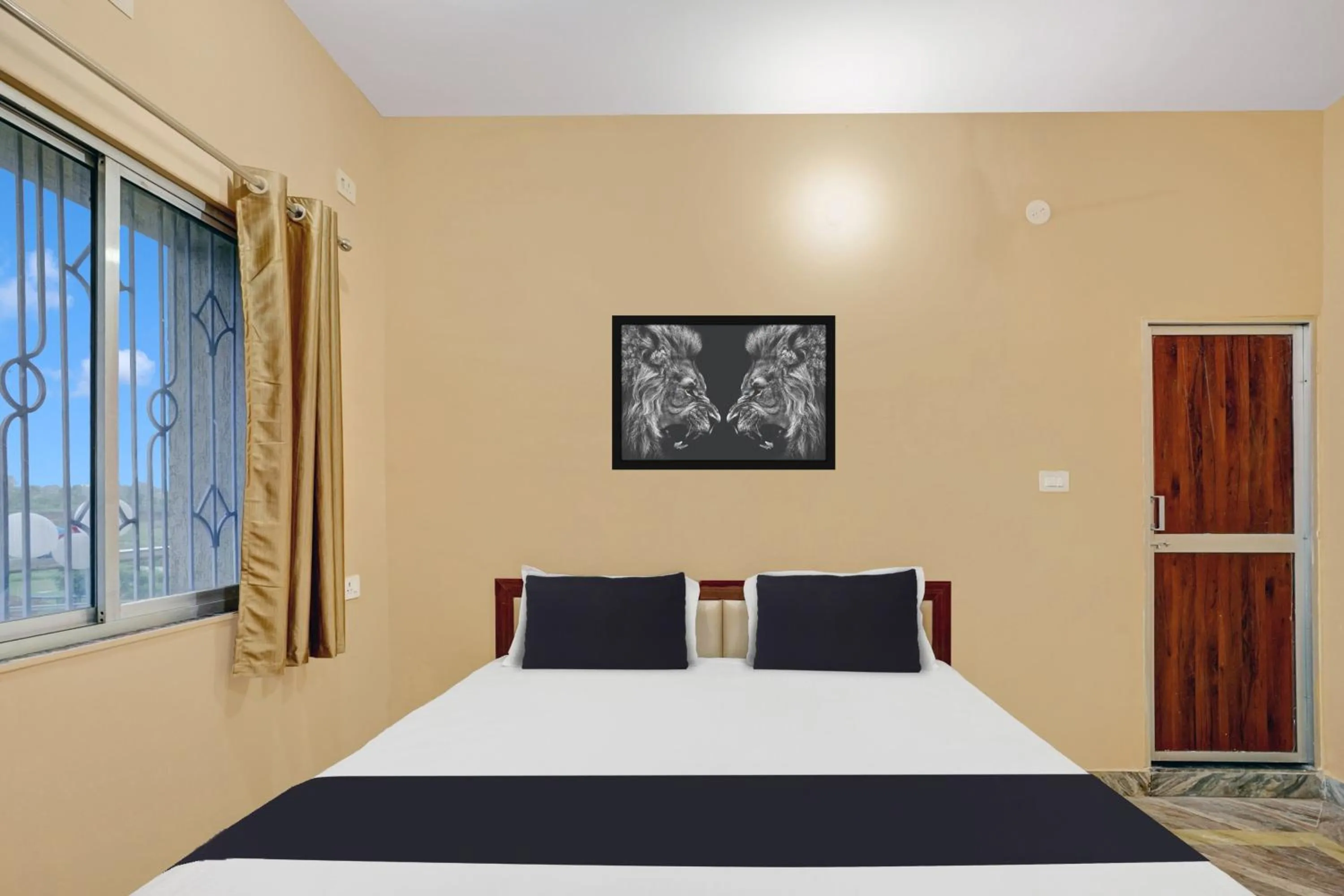 Bedroom in Hotel O Mayur Residency