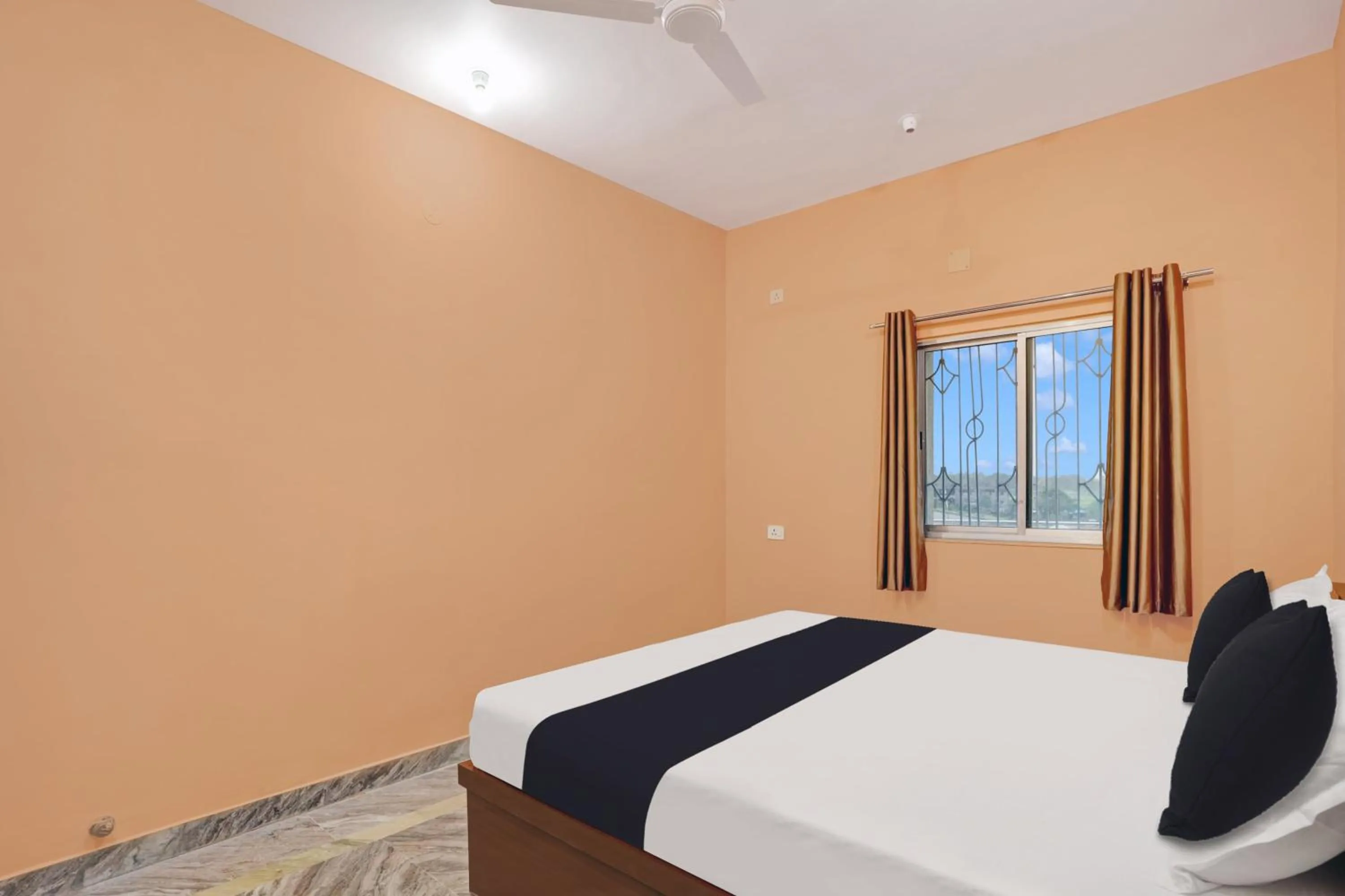 Bedroom in Hotel O Mayur Residency