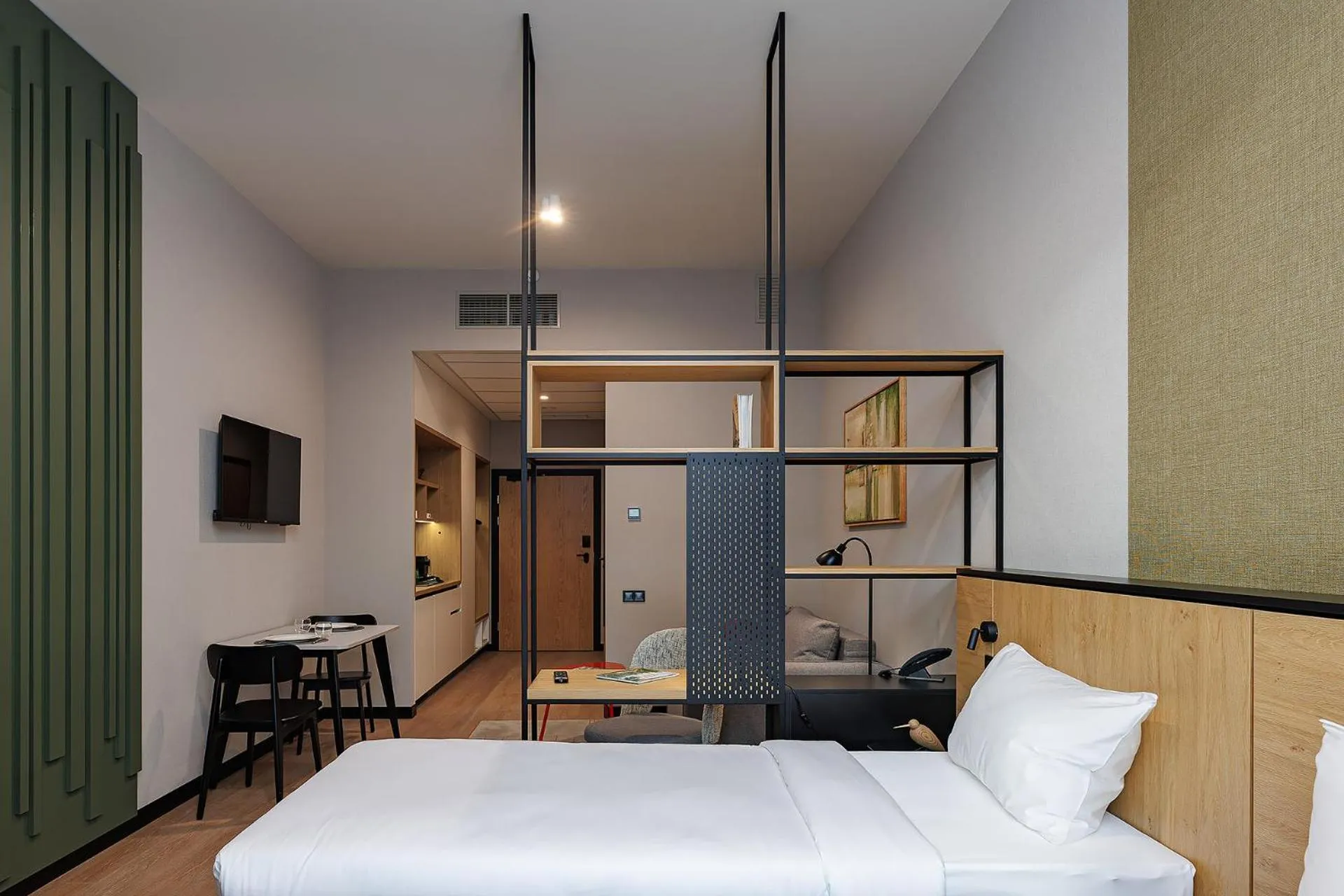 Communal lounge/ TV room, Bed in TULIP Residences Lviv