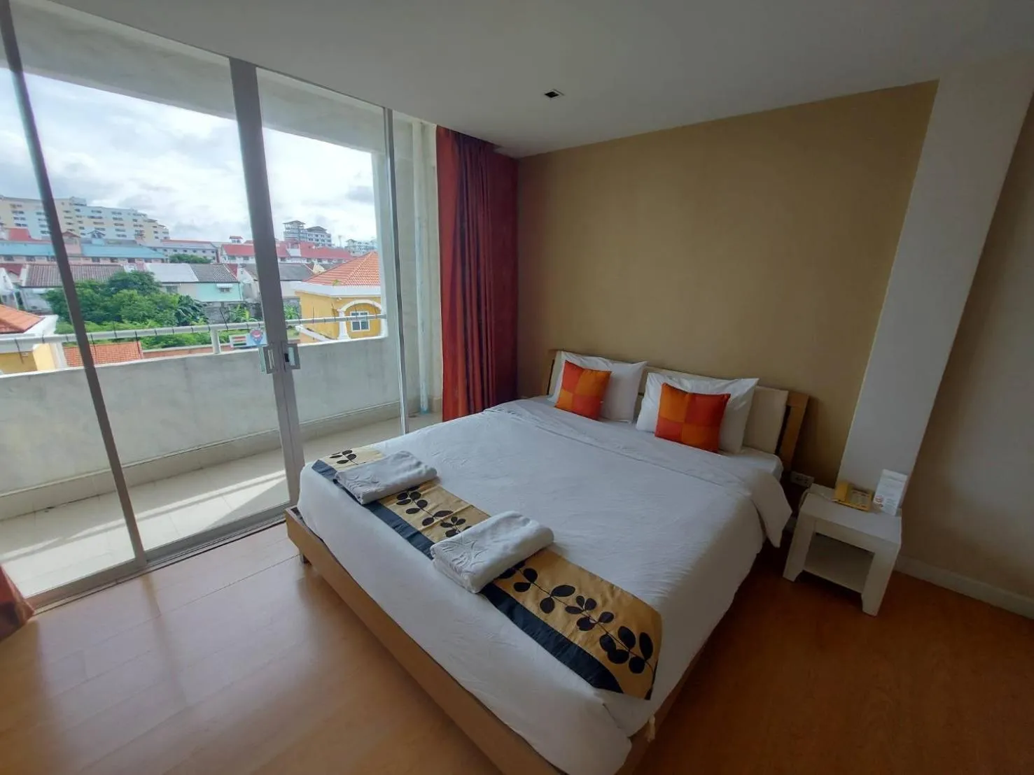 Bed in Grandsmile Wellness Resort