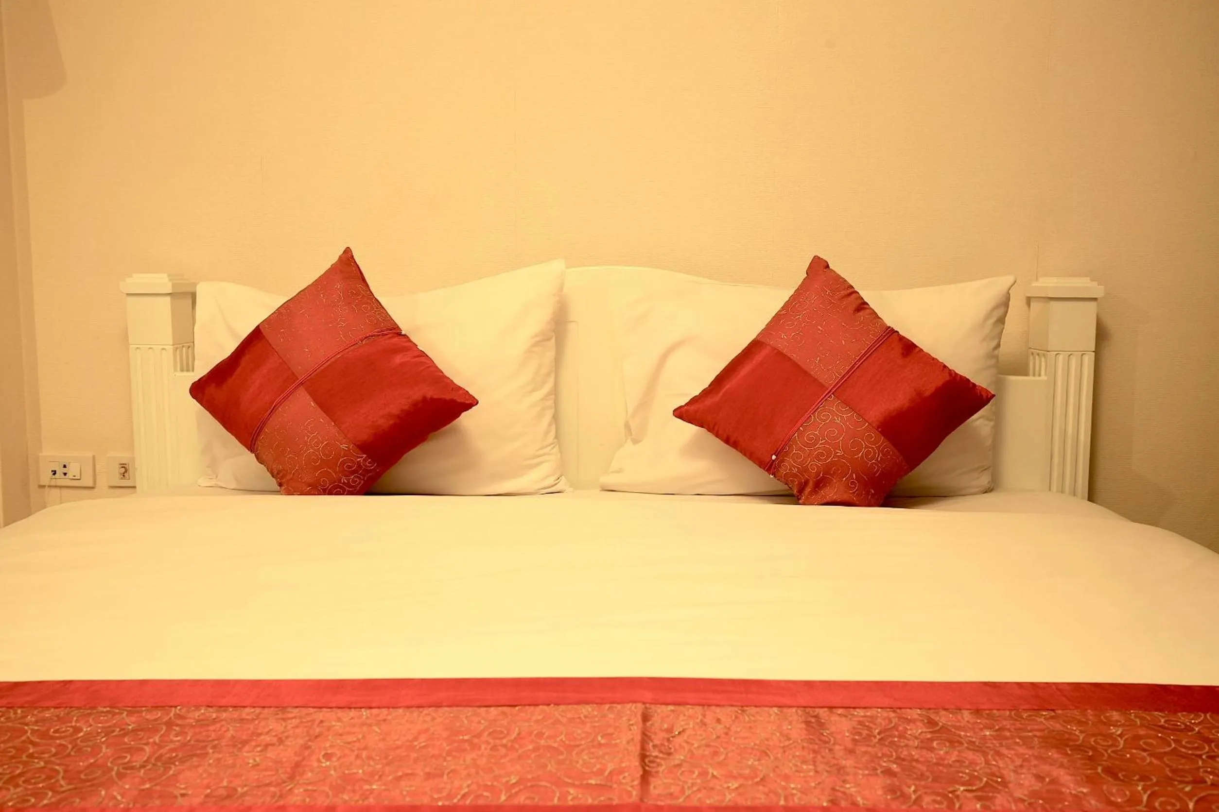 Bed in Grandsmile Wellness Resort