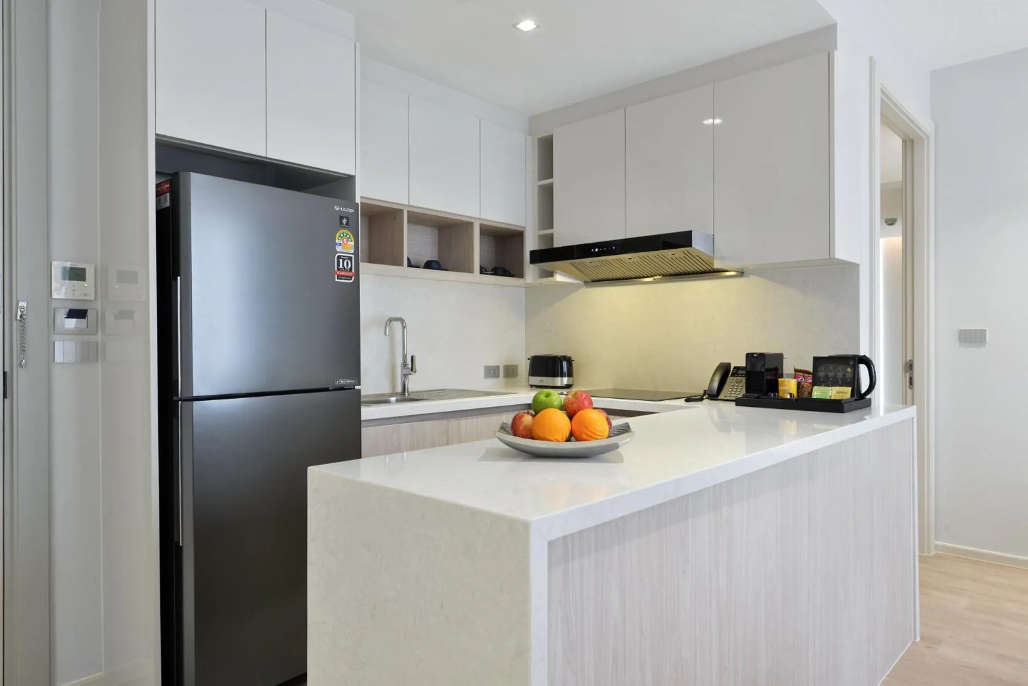 Kitchen or kitchenette in GM Estate Hotel and Executive Apartments, Bangkok Sukhumvit 20