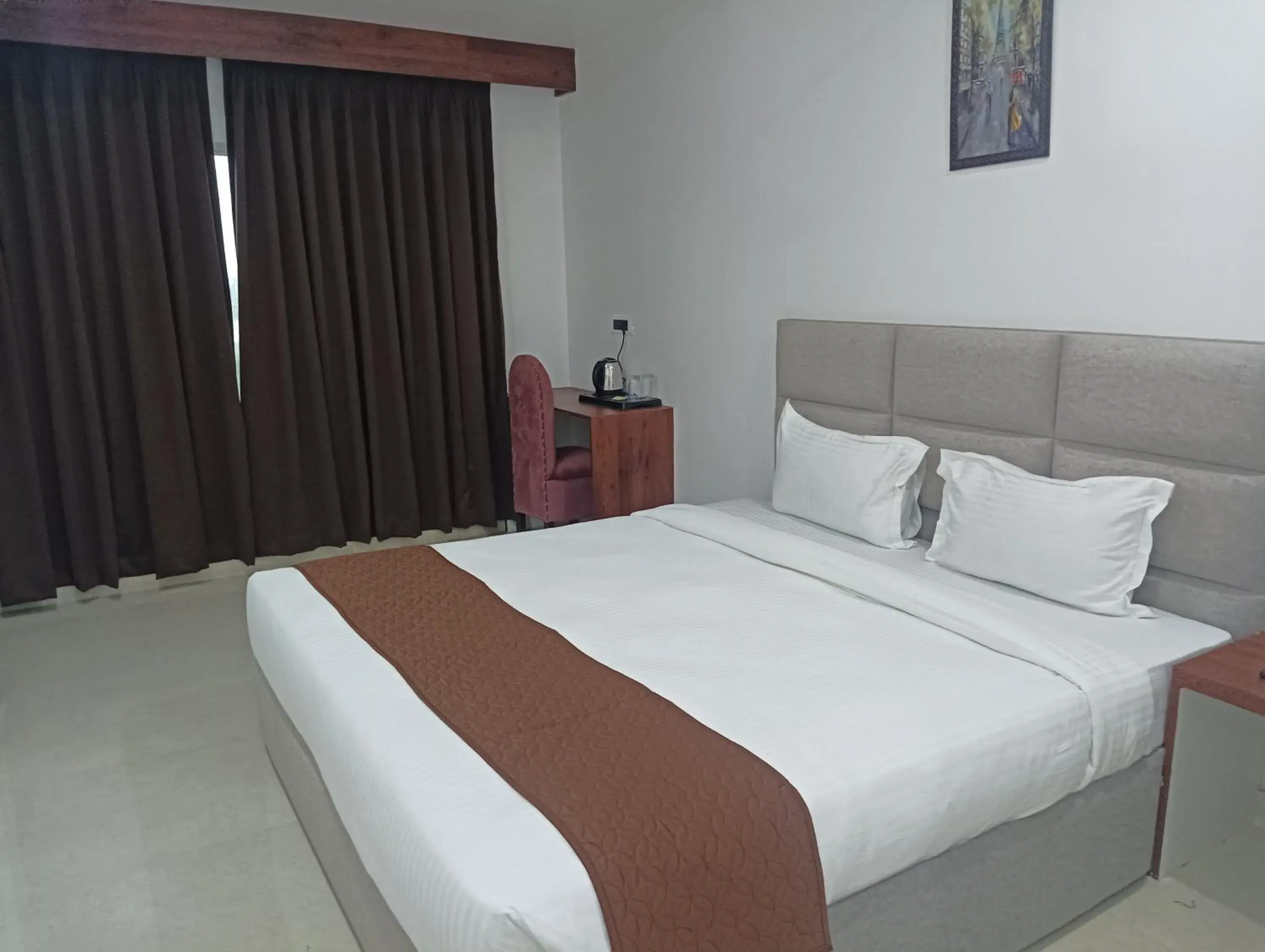 Bed in Hotel RKD Inn Bed in Hotel RKD Inn