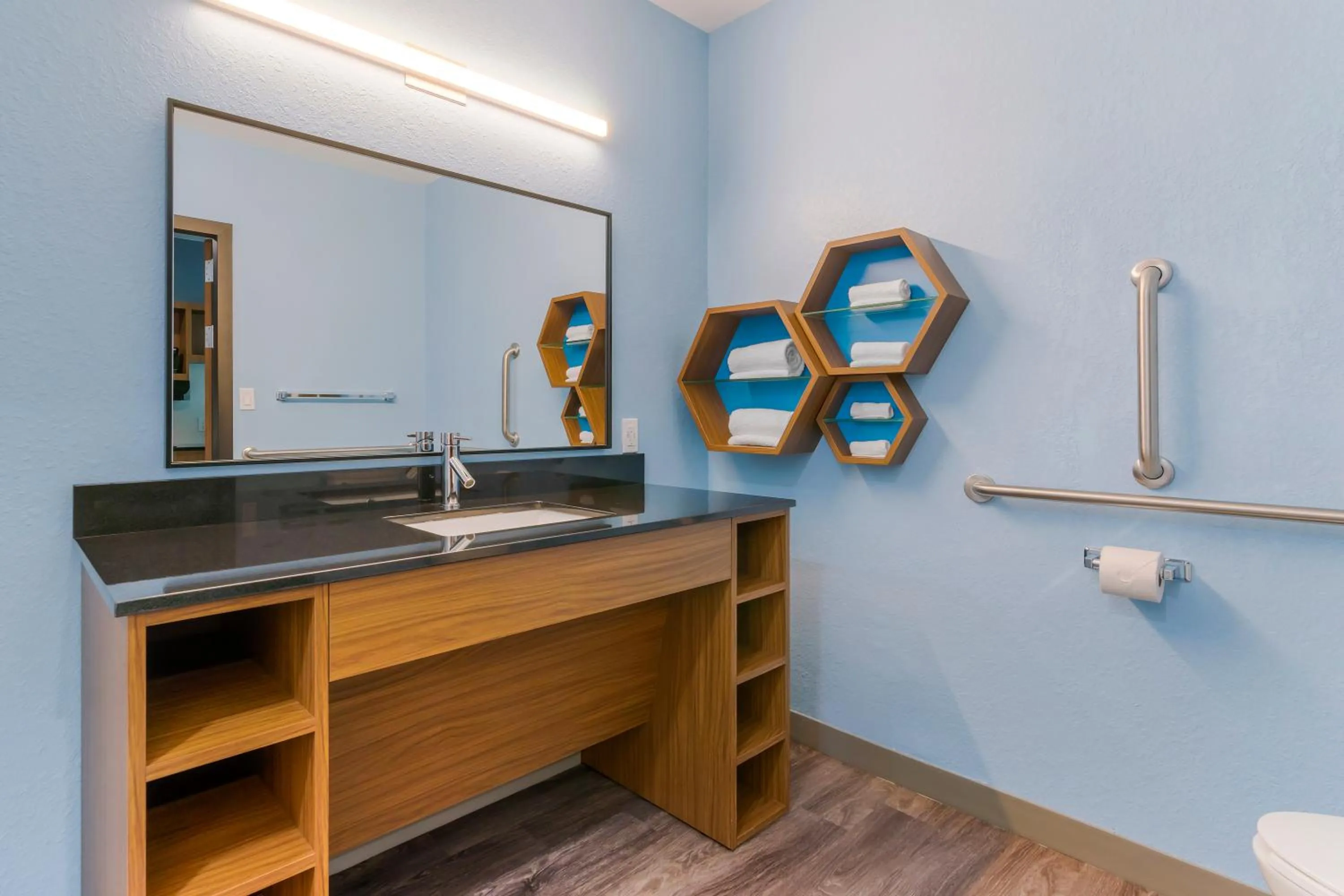 Bathroom in HomeTowne Studios by Red Roof Tampa - Airport