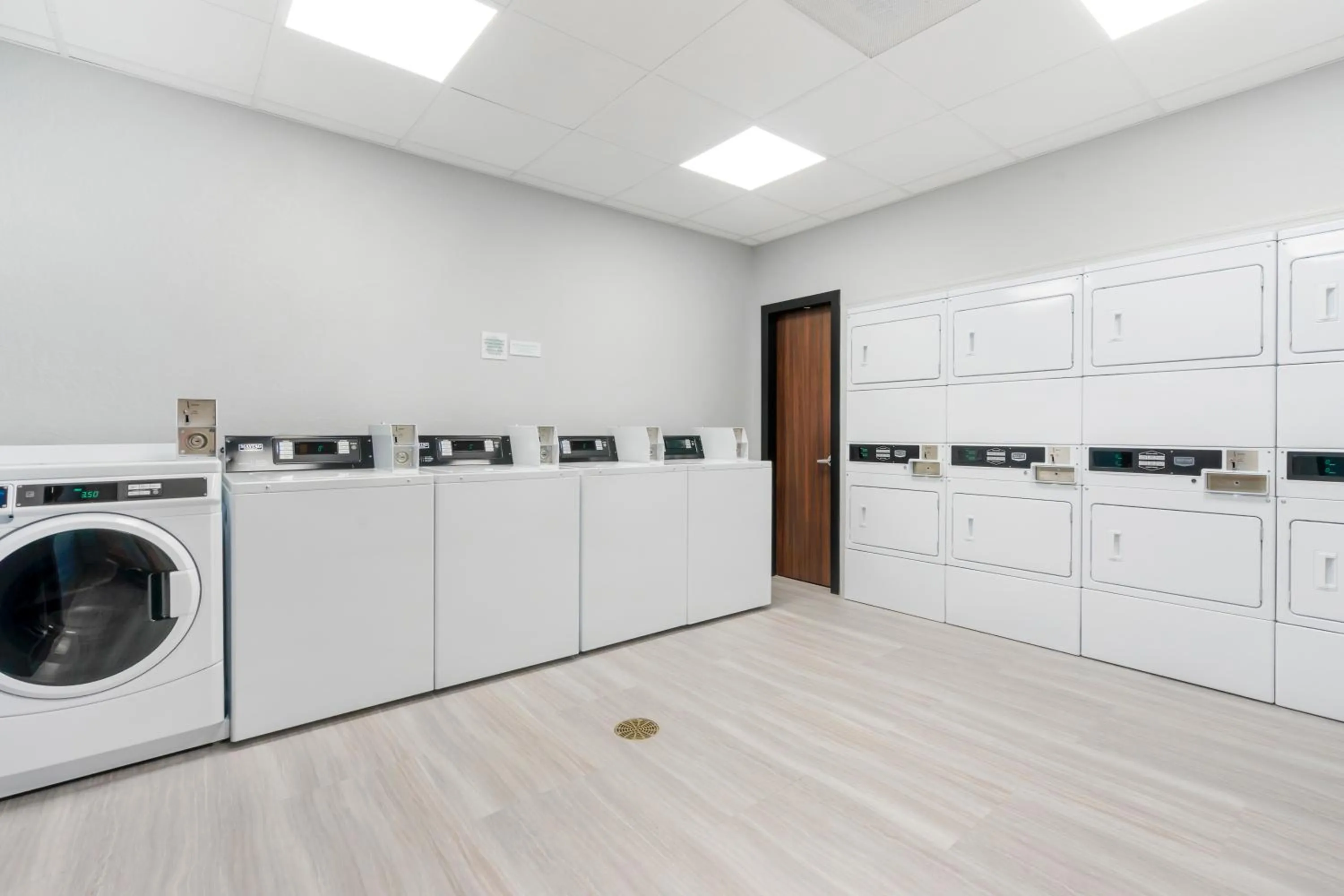 laundry in HomeTowne Studios by Red Roof Tampa - Airport