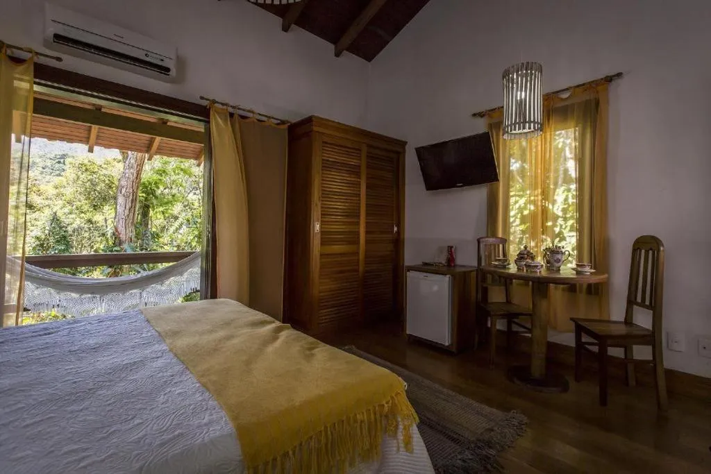Bedroom, Bed in Hotel Colinas de Petropolis