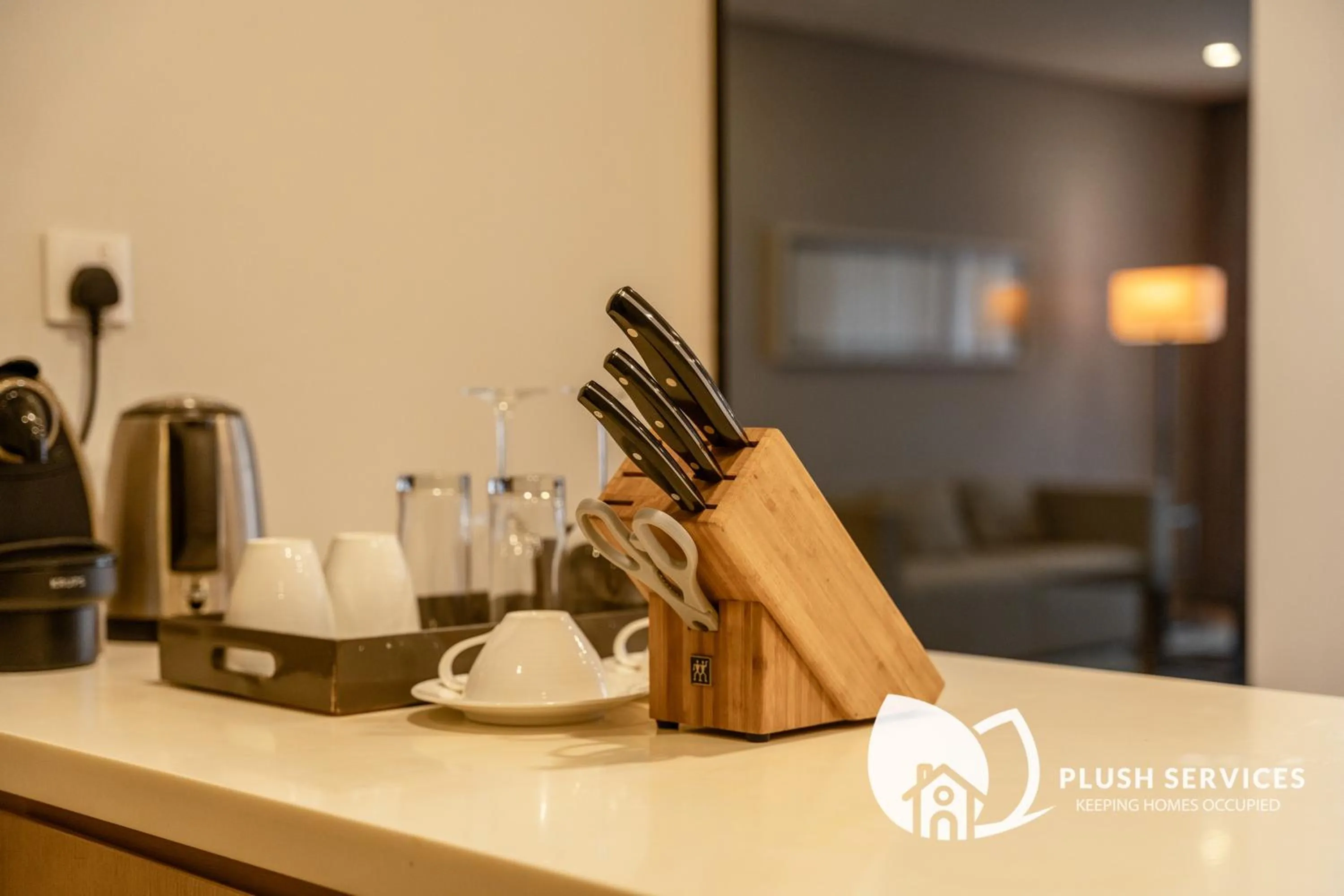Kitchen or kitchenette in 188 Premium Suites by Plush