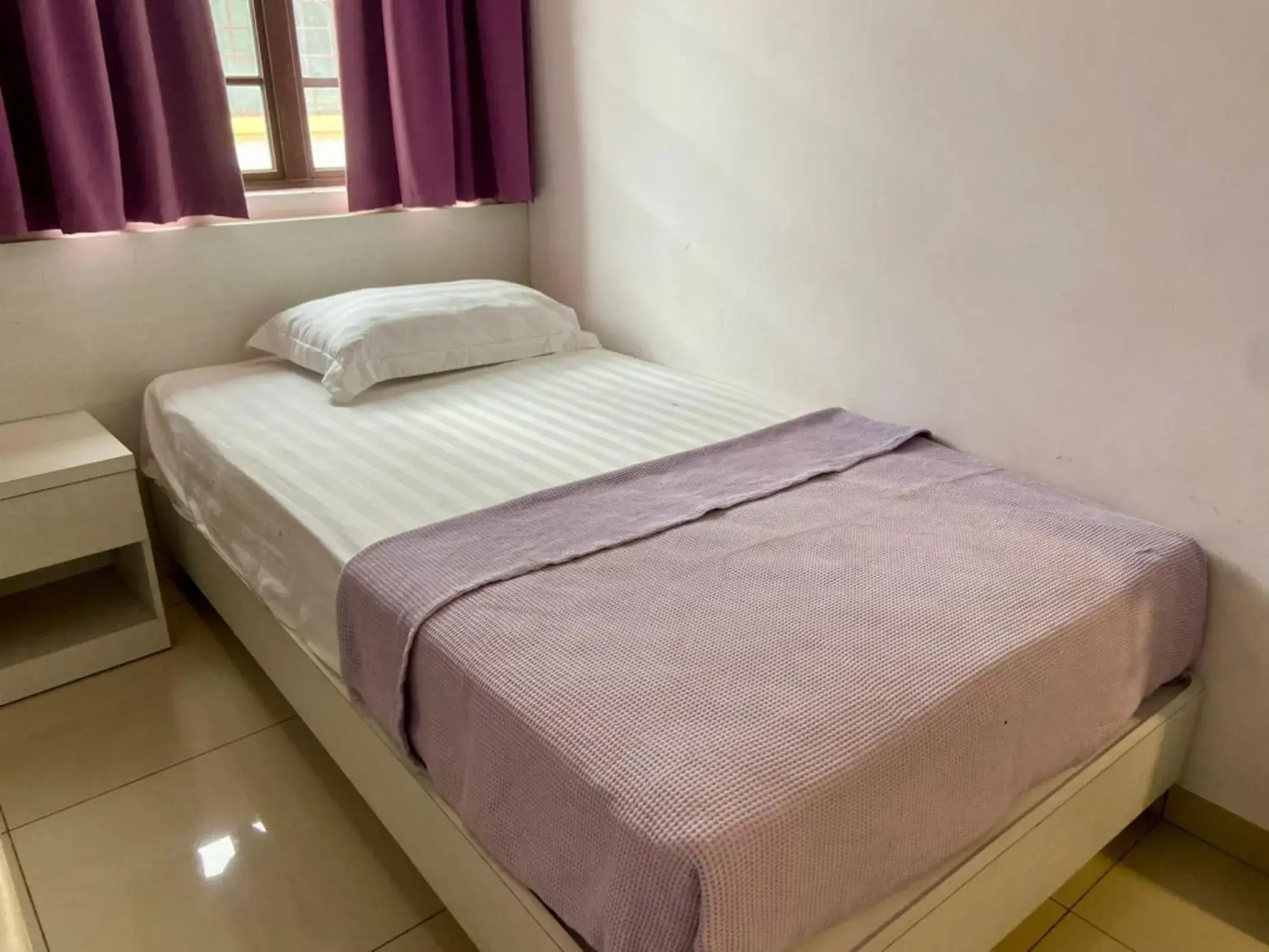 Bed in Lavender Riverside Hotel Bed in Lavender Riverside Hotel