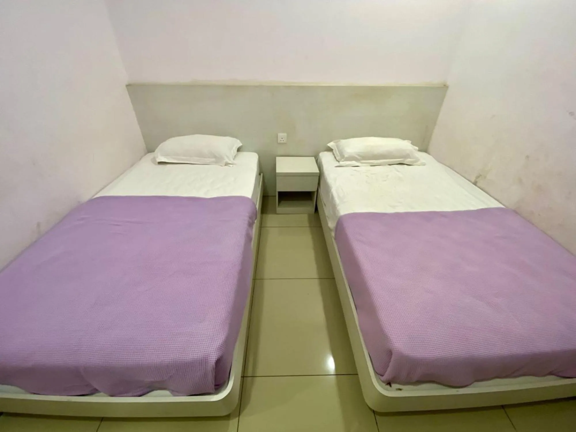 Bed in Lavender Riverside Hotel