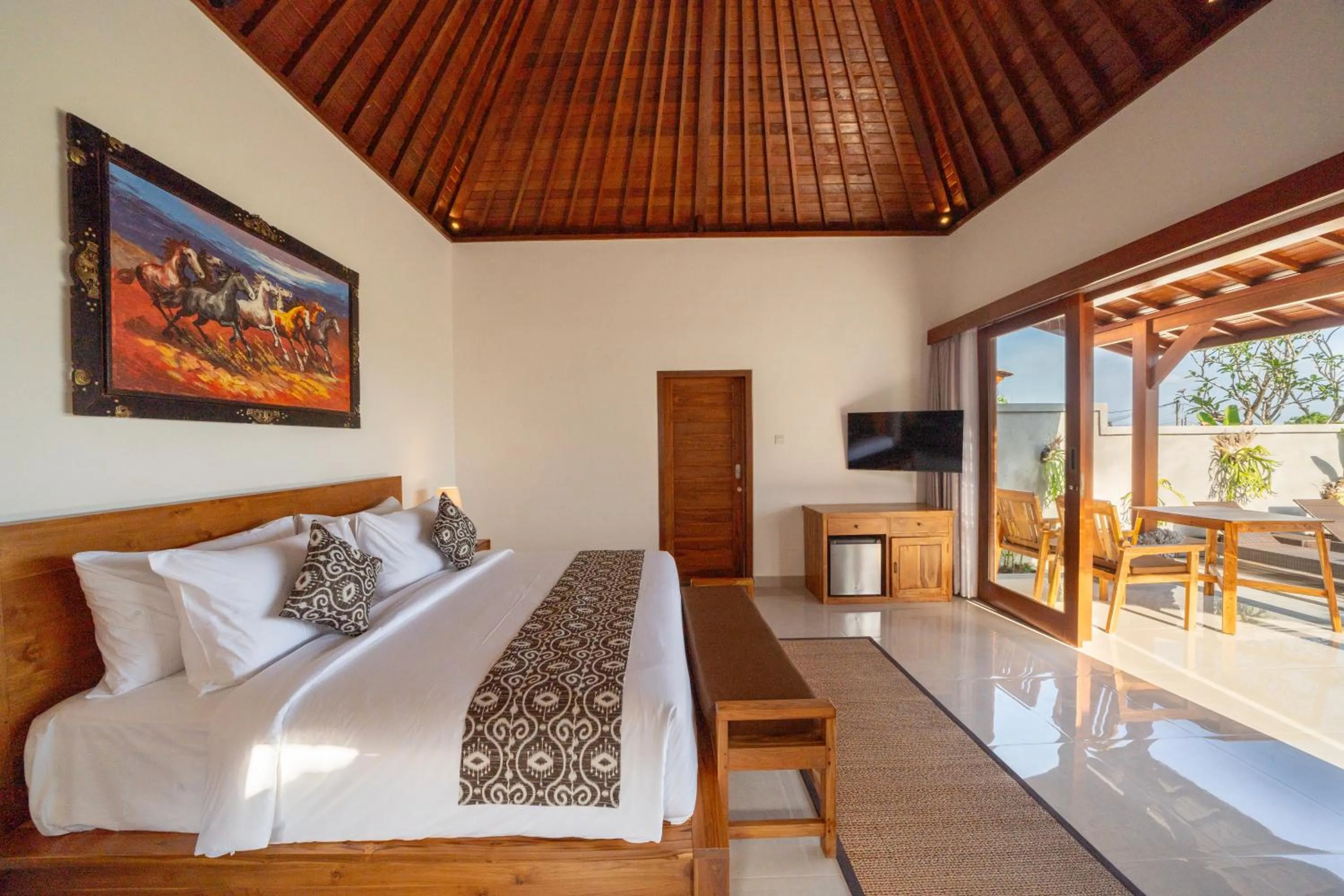 Bed in Kaki Uma Villa