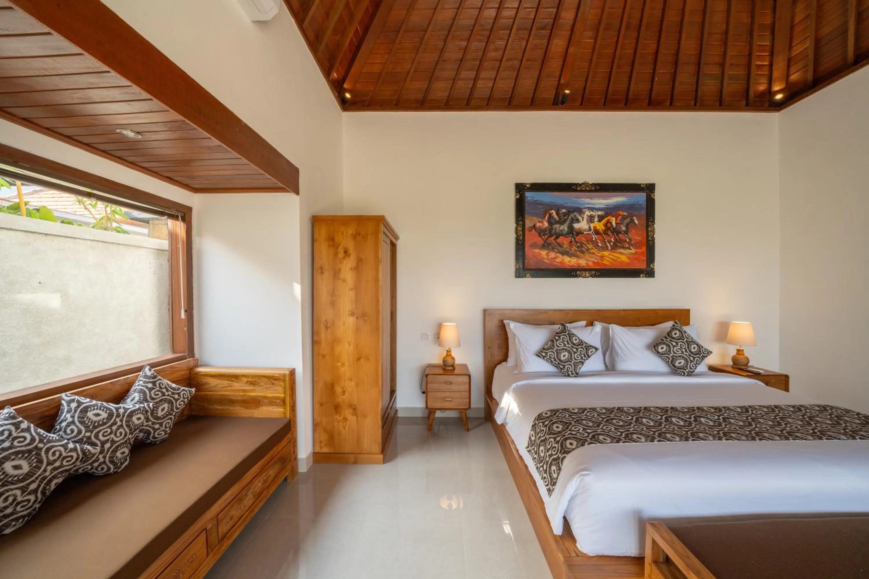 Bed in Kaki Uma Villa