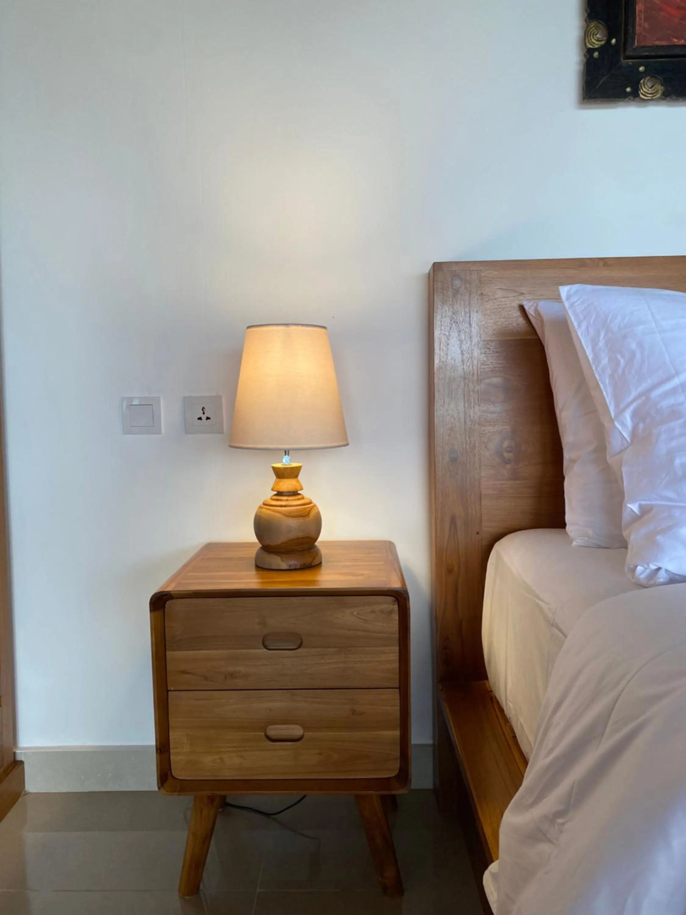 Decorative detail, Bed in Kaki Uma Villa