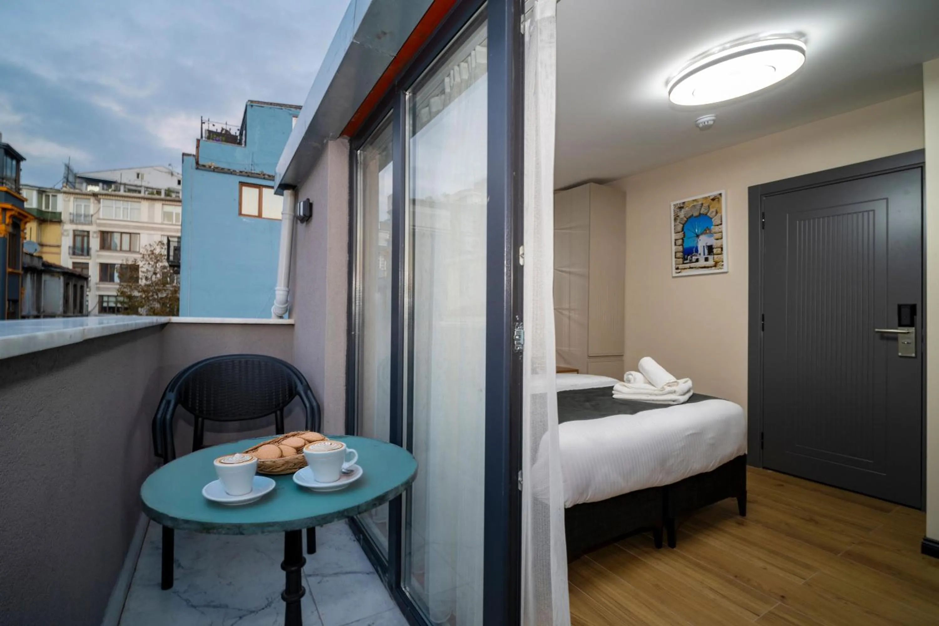 View (from property/room), Bed in Robin Hotel