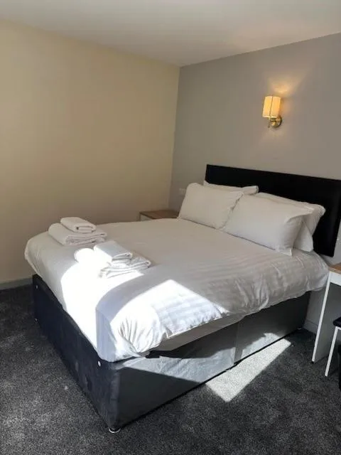 Bed in The Wyken Inn