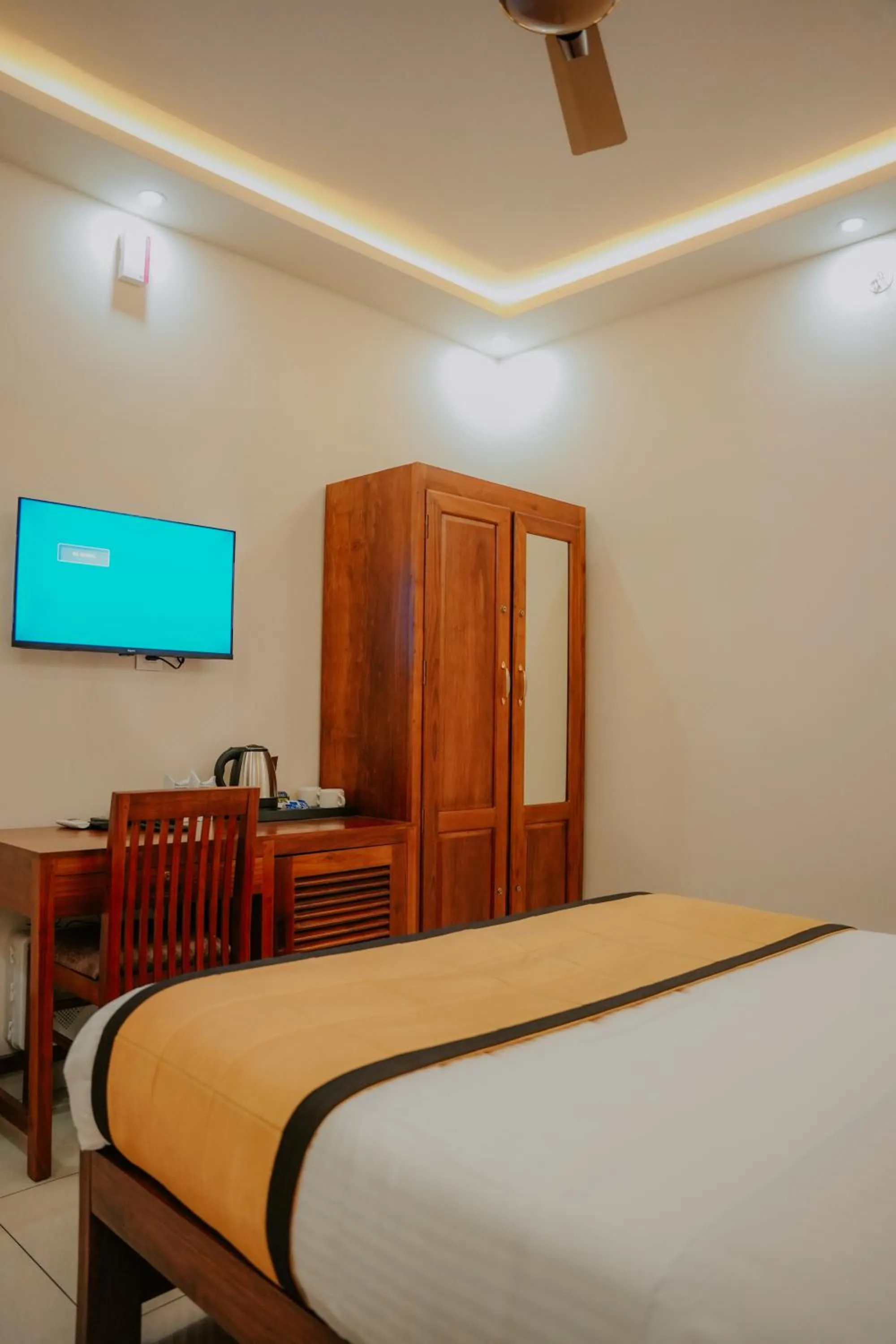 Bed in Makkiyil Residency