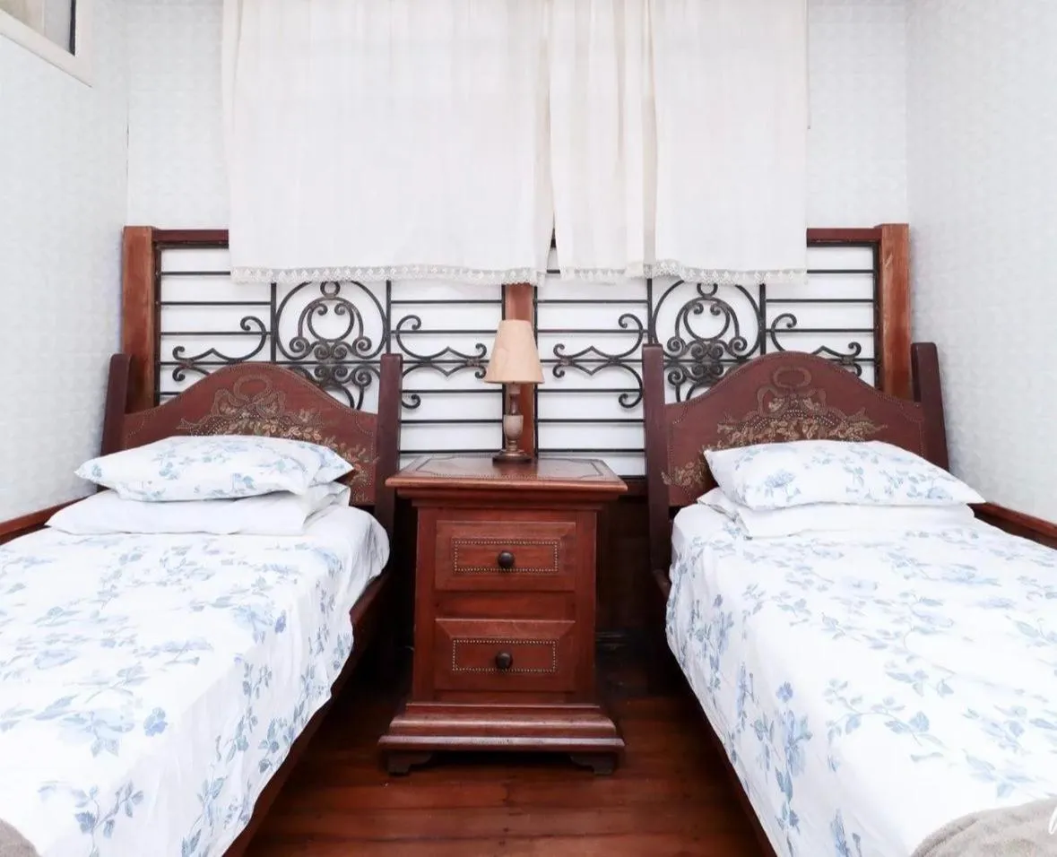 Bed in Pousada Casarão 53