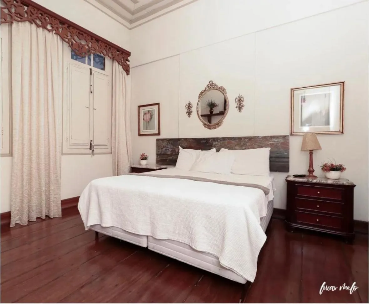 Bed in Pousada Casarão 53