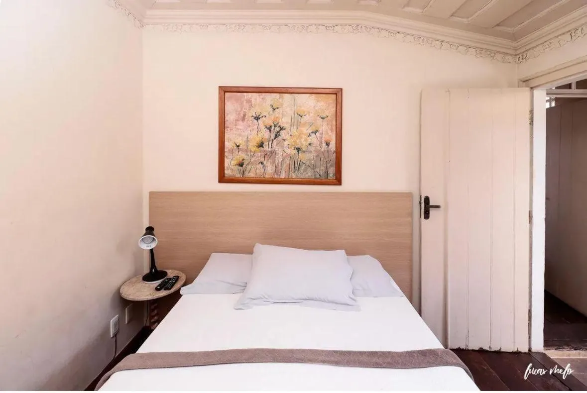 Bed in Pousada Casarão 53