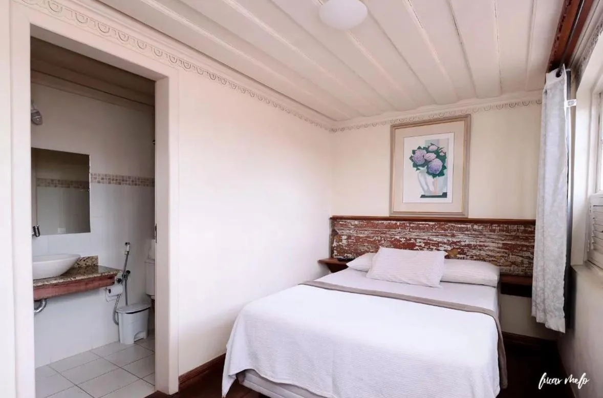 Bed in Pousada Casarão 53