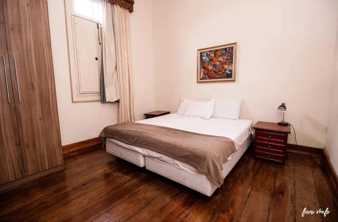 Bed in Pousada Casarão 53