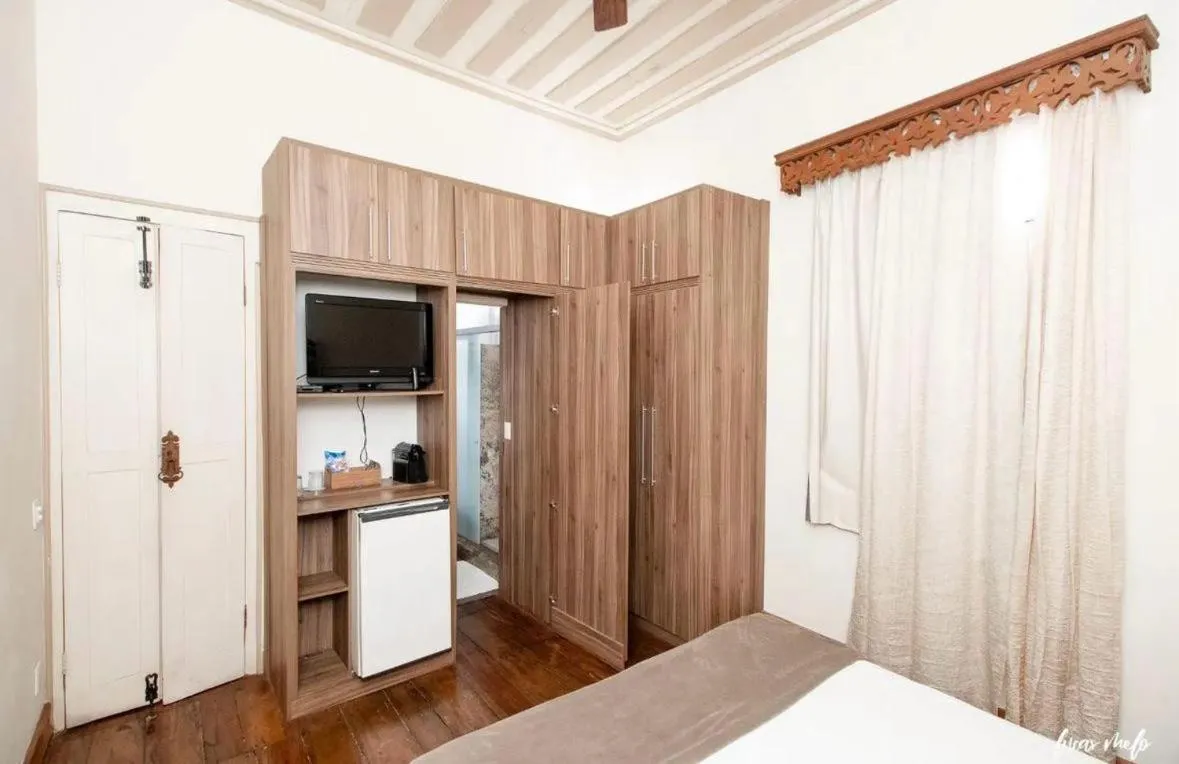 Bed in Pousada Casarão 53