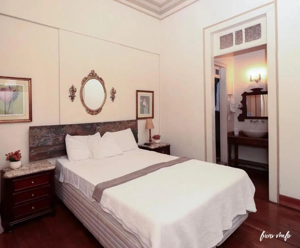 Bed in Pousada Casarão 53