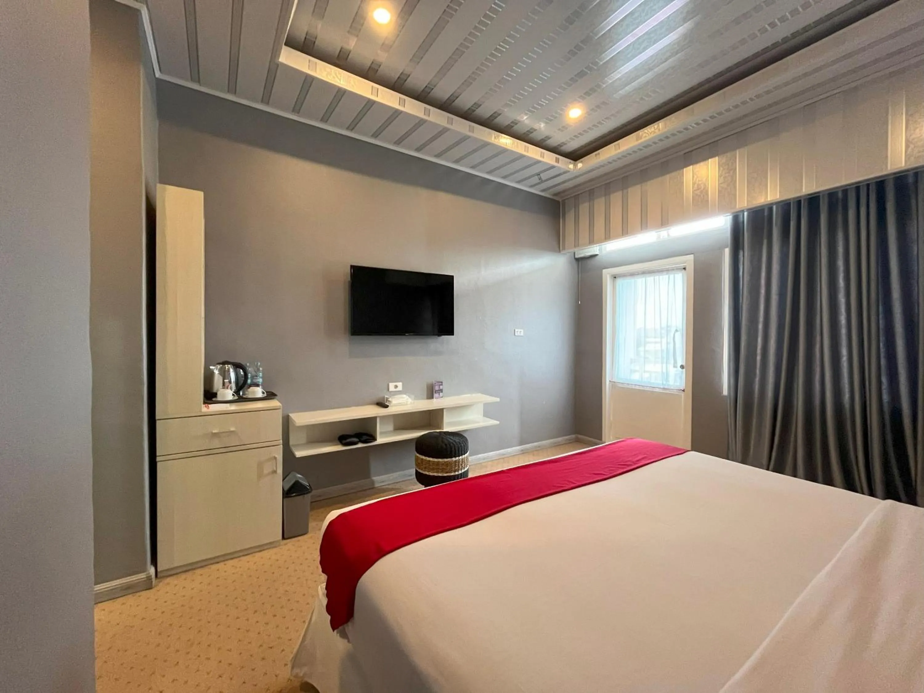 Bed in Grand Tamaro Hotel