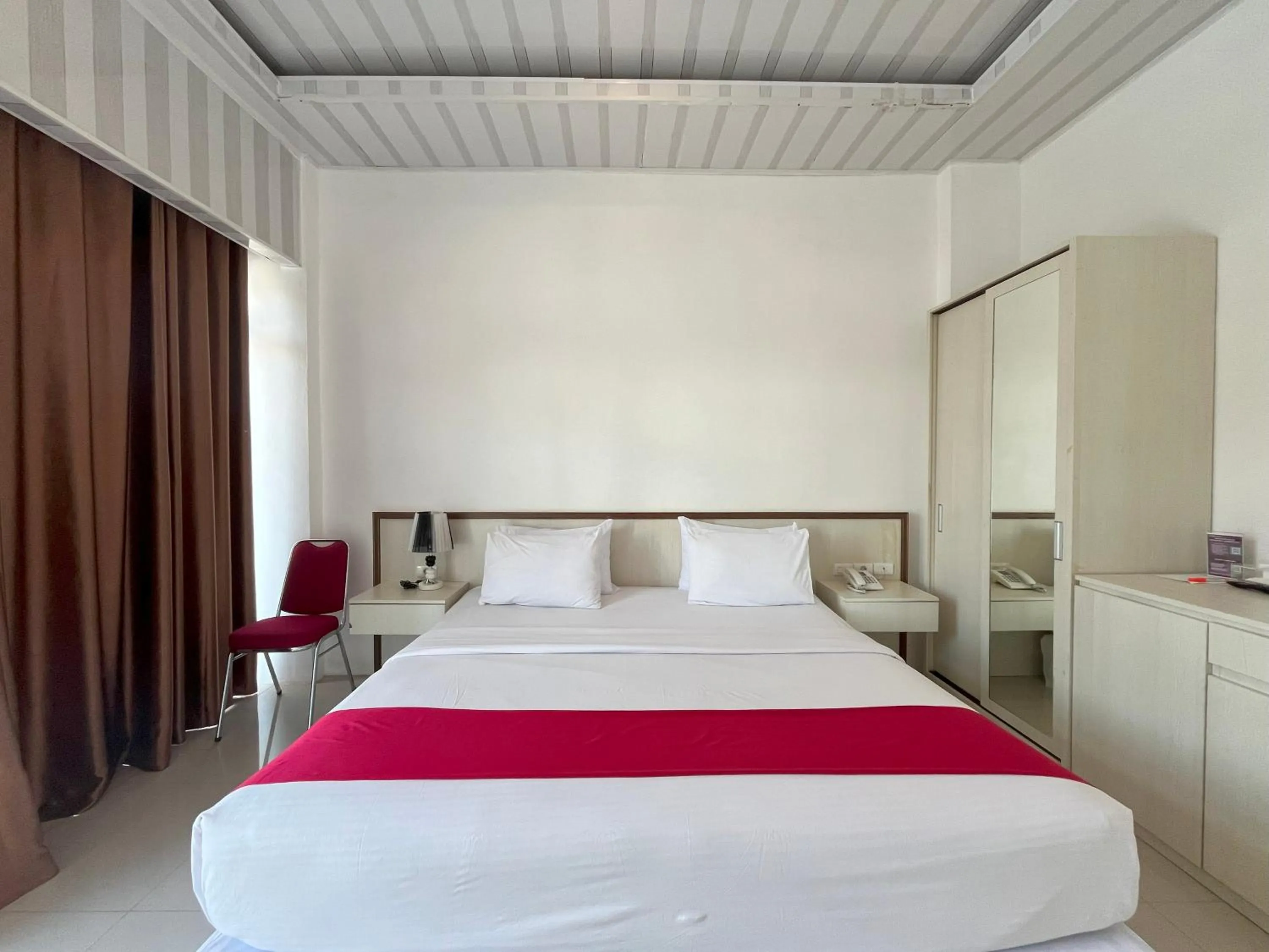 Bed in Grand Tamaro Hotel