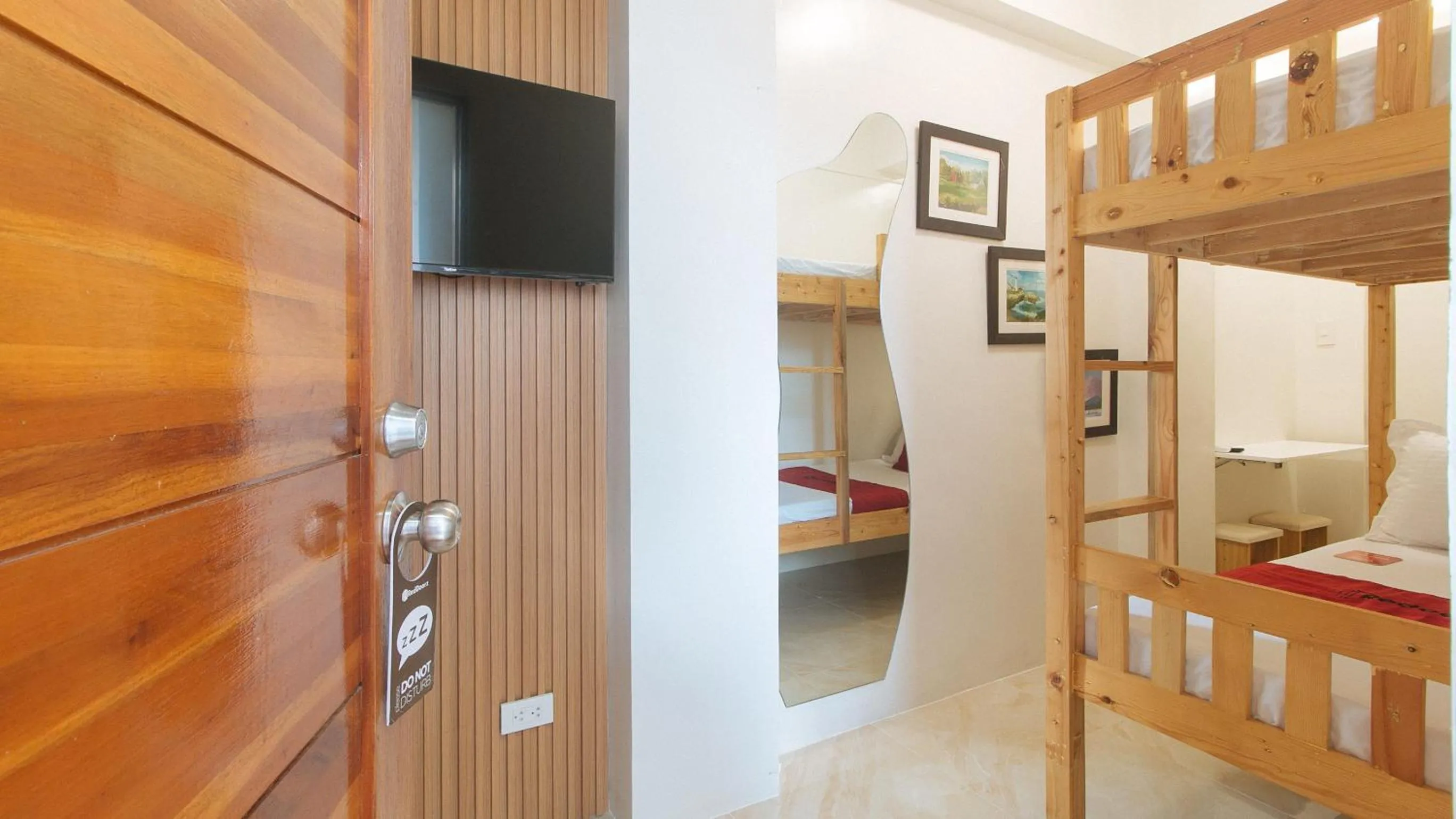 TV and multimedia, Bed in RedDoorz at Delorian Residences