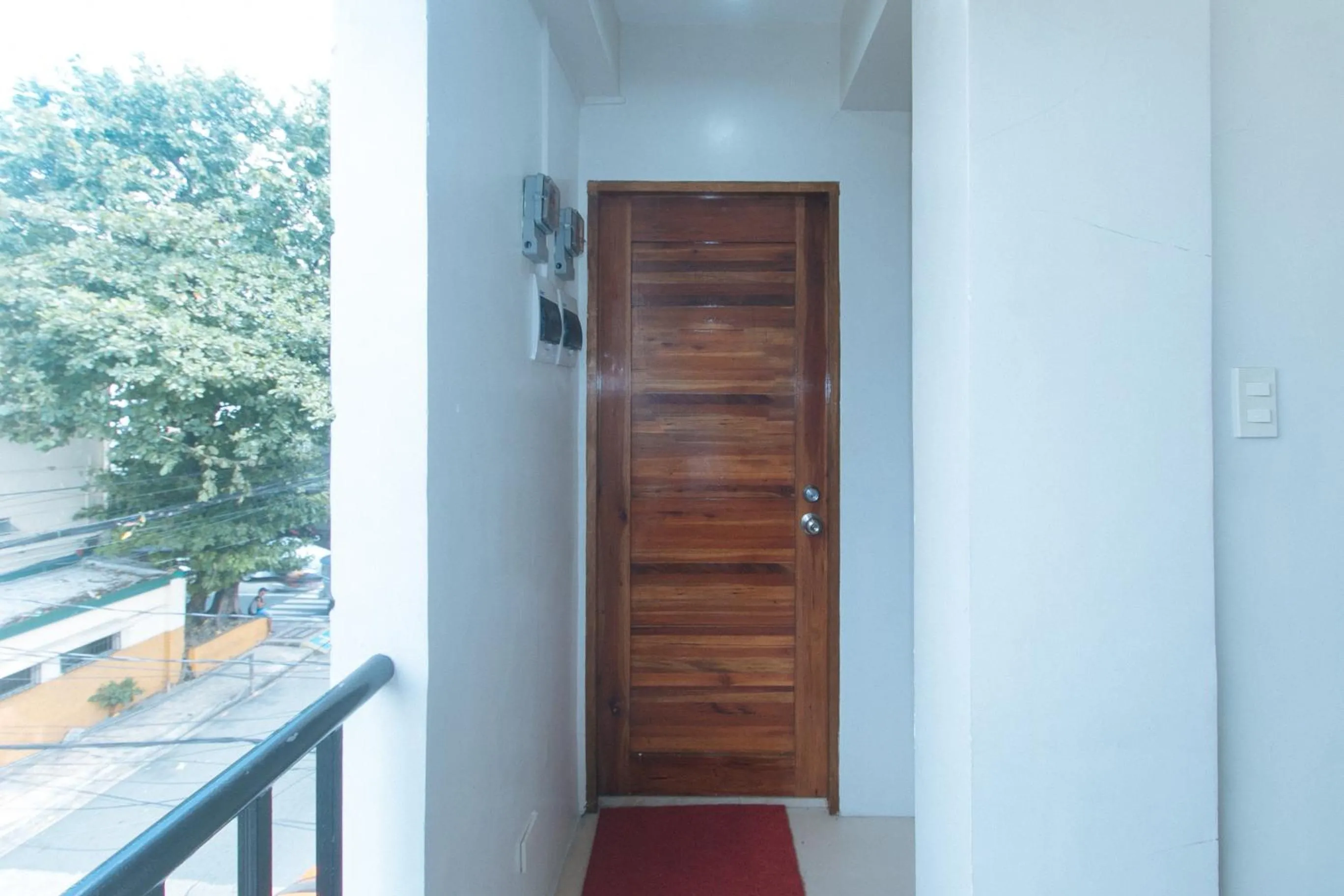 Balcony/Terrace in RedDoorz at Delorian Residences