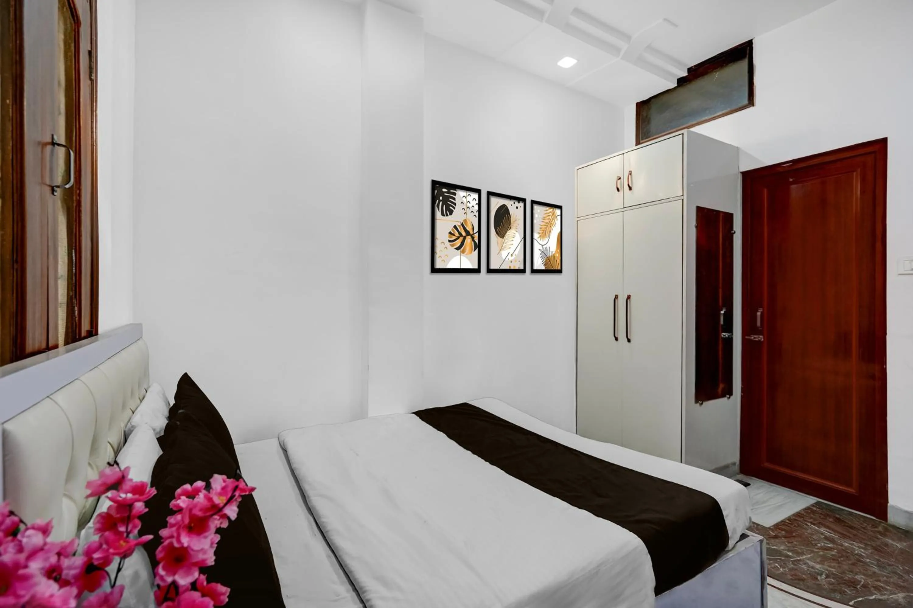 Bedroom, Bed in Super Hotel O Iskcon Temple Rohini Formerly Golden Key