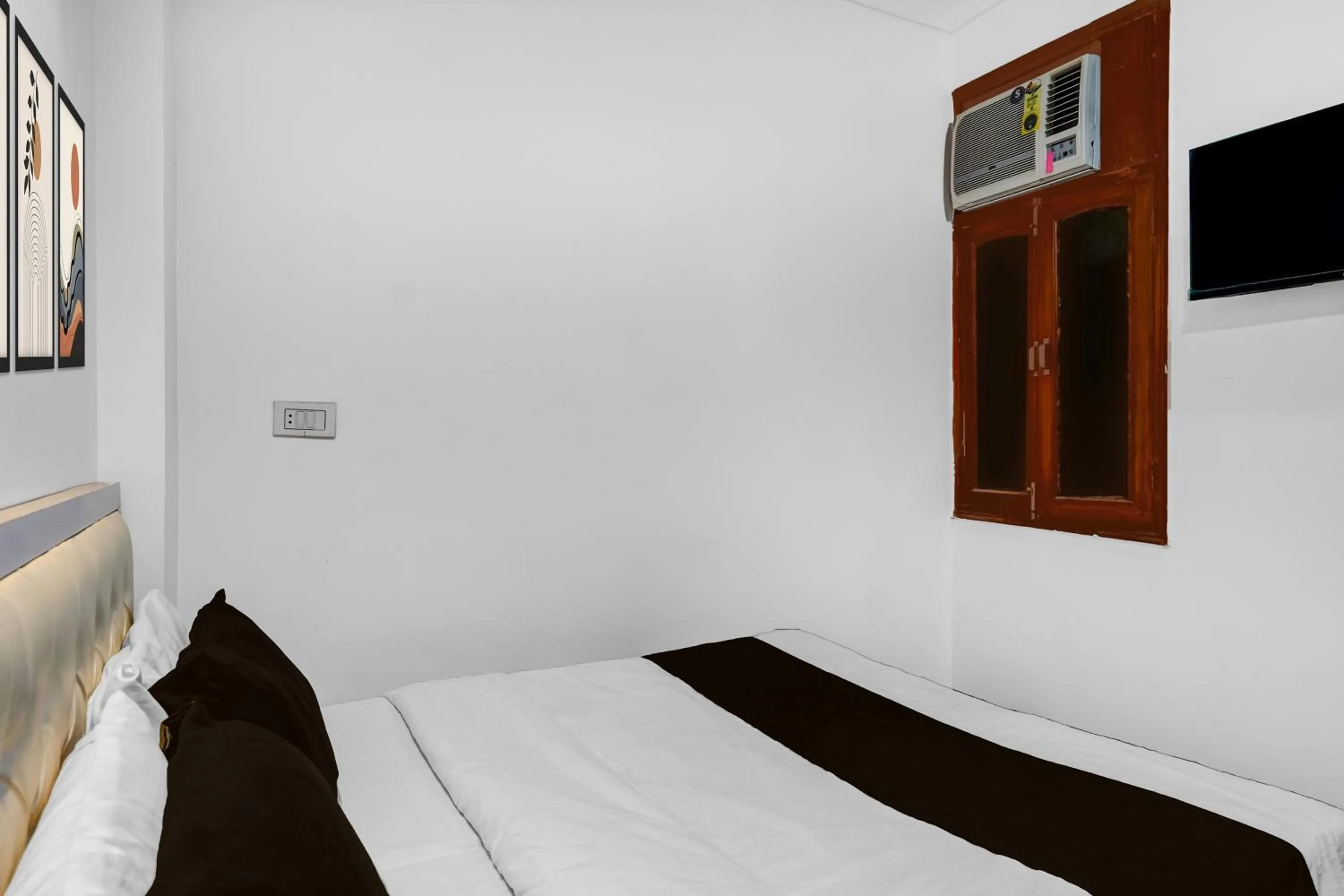 Bedroom, Bed in Super Hotel O Iskcon Temple Rohini Formerly Golden Key
