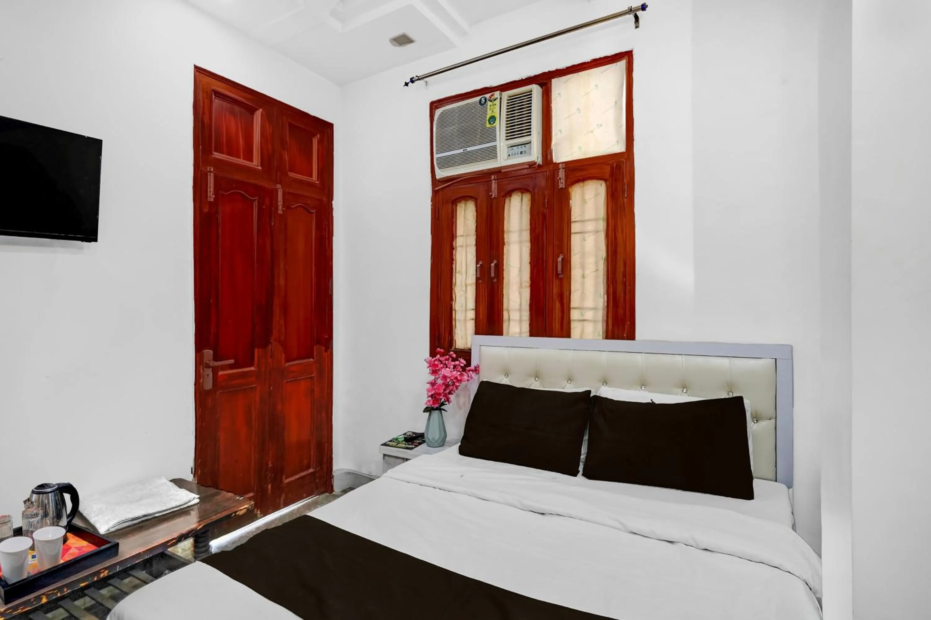 Bedroom, Bed in Super Hotel O Iskcon Temple Rohini Formerly Golden Key
