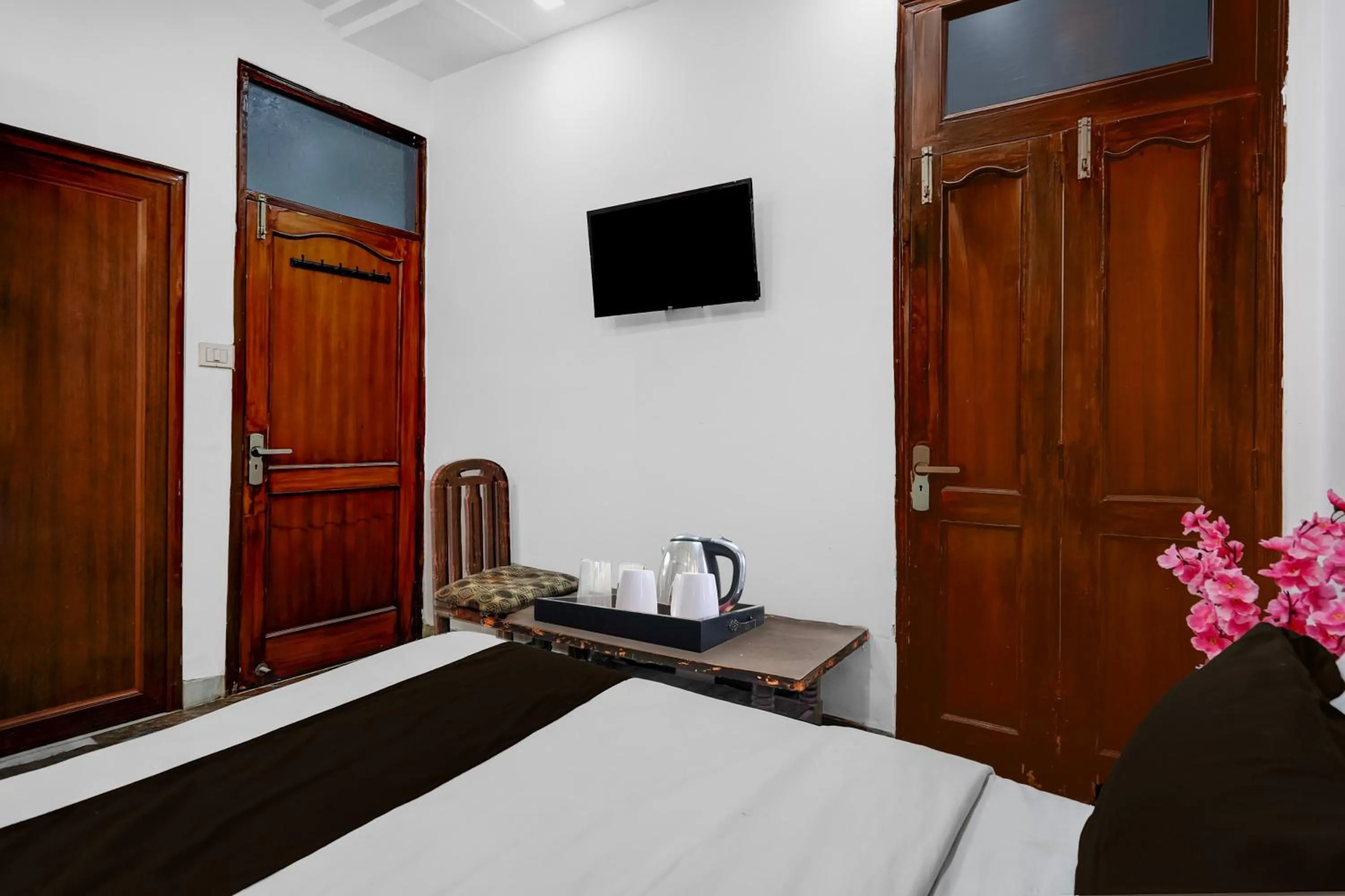 Bedroom, Bed in Super Hotel O Iskcon Temple Rohini Formerly Golden Key