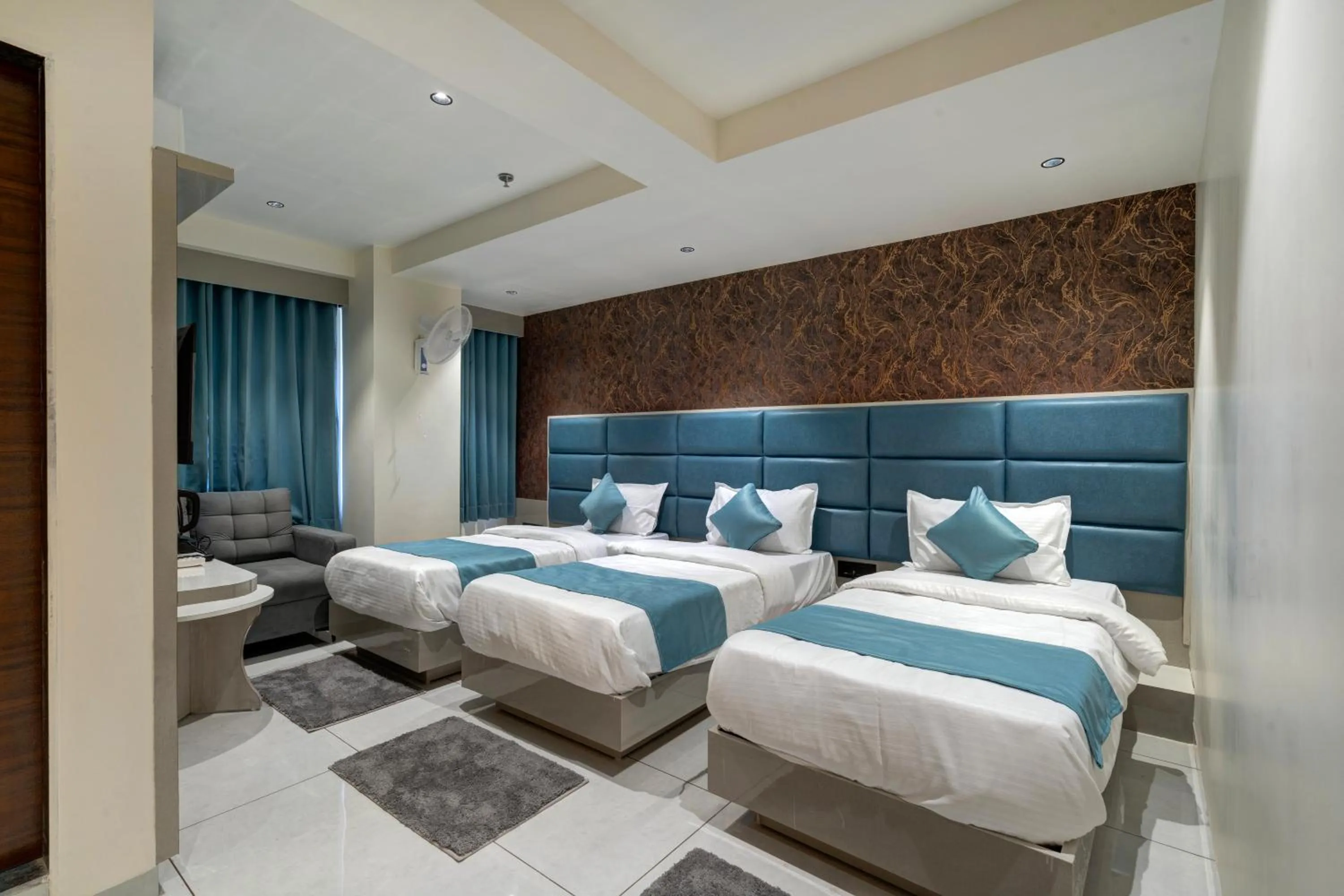 Bed in Hotel Shrimad Villa Gandhinagar