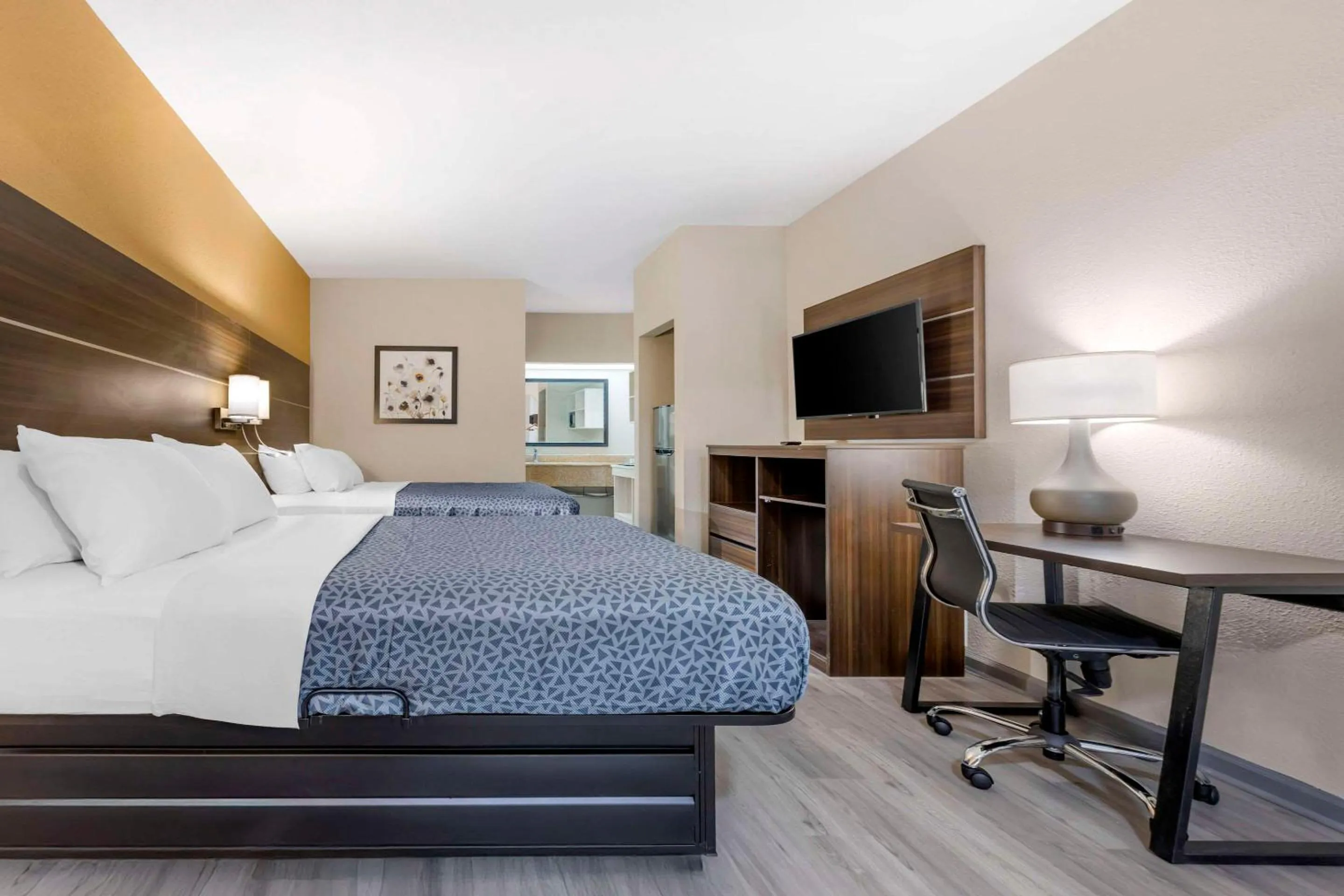 Bedroom, Bed in Suburban Studios Orangeburg