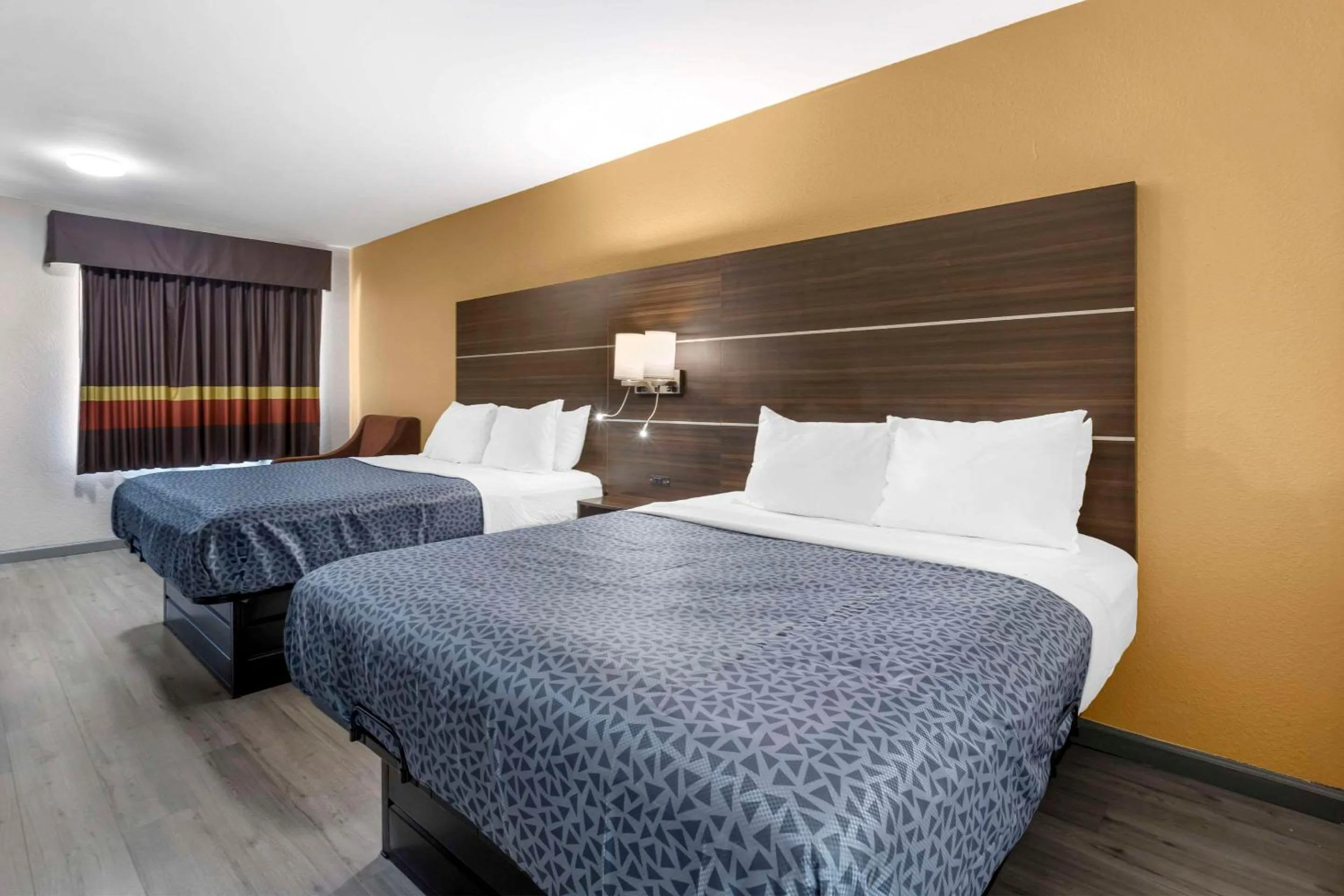 Bedroom, Bed in Suburban Studios Orangeburg