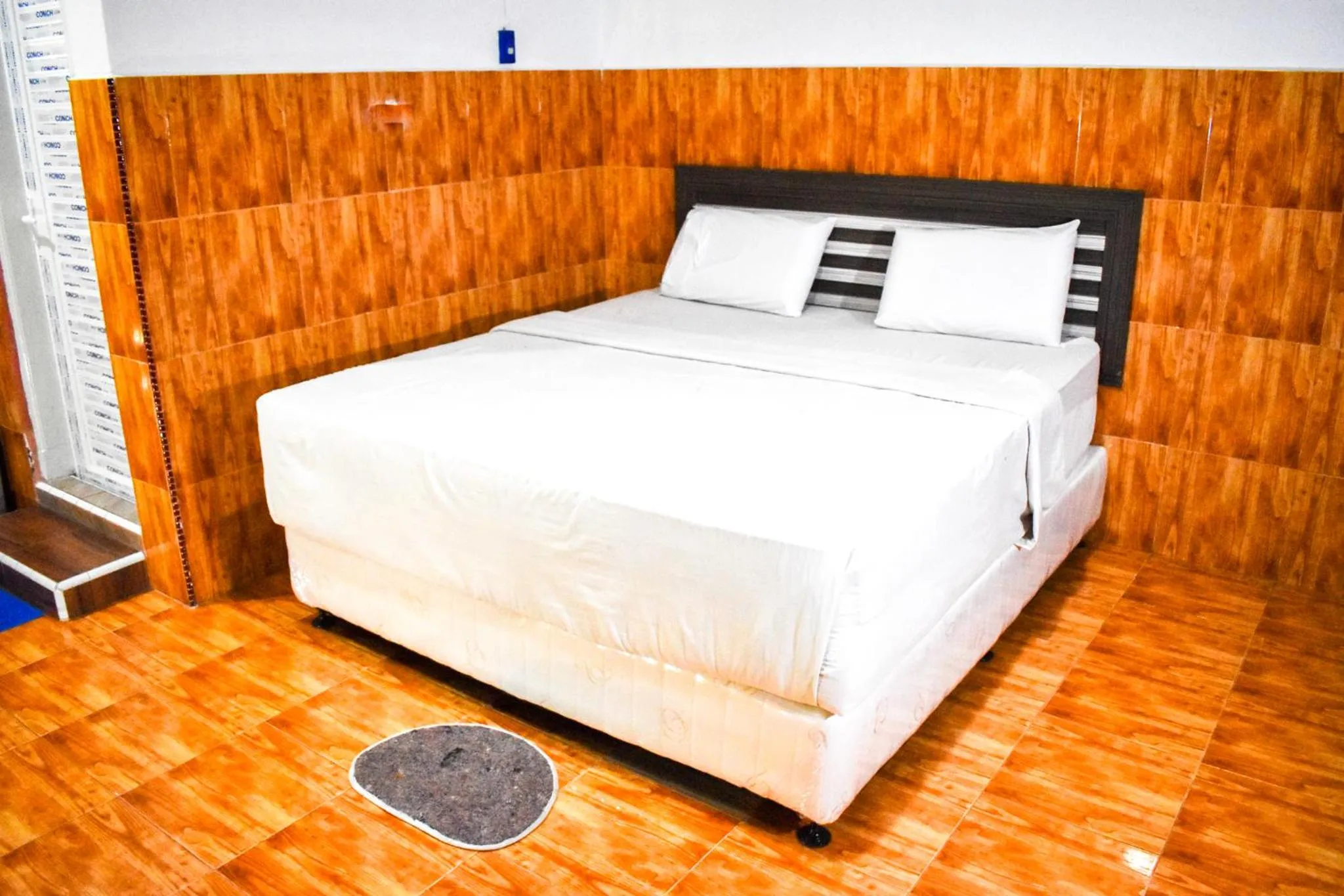 Bed in Hotel Grand Bandara