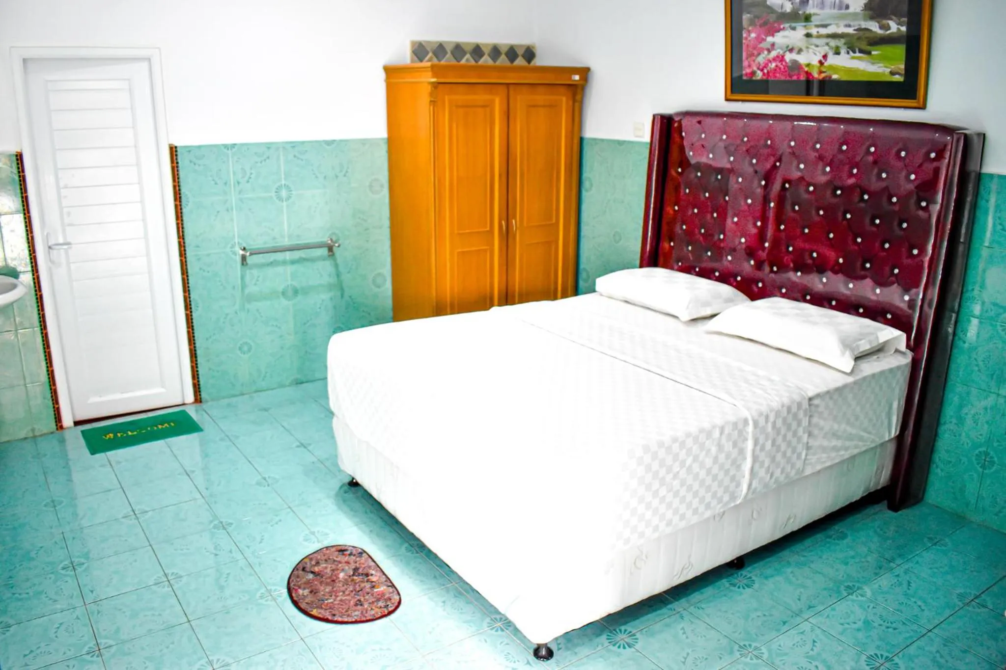 Bed in Hotel Grand Bandara