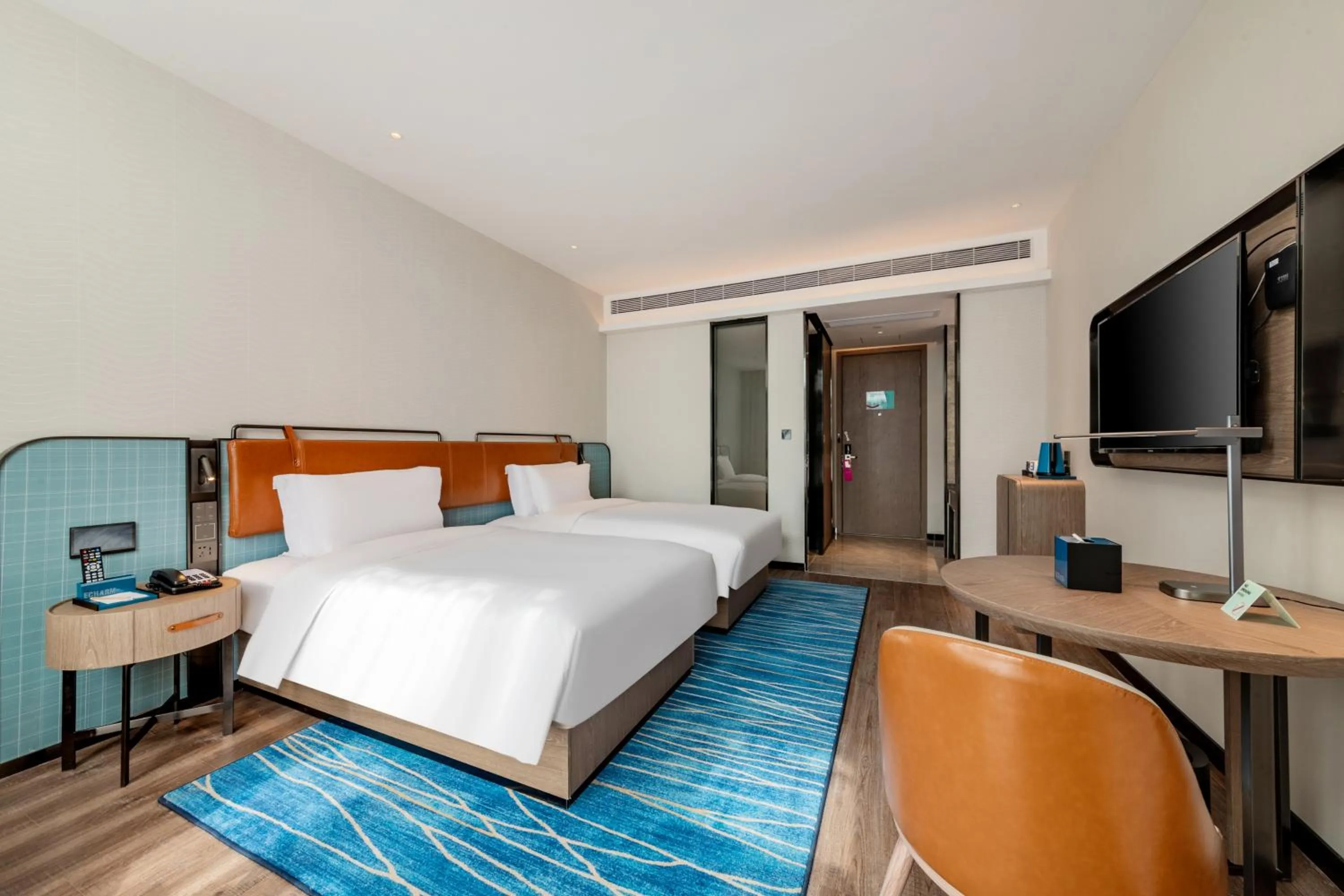 Bed in Echarm Hotel Yichang East Railway Station