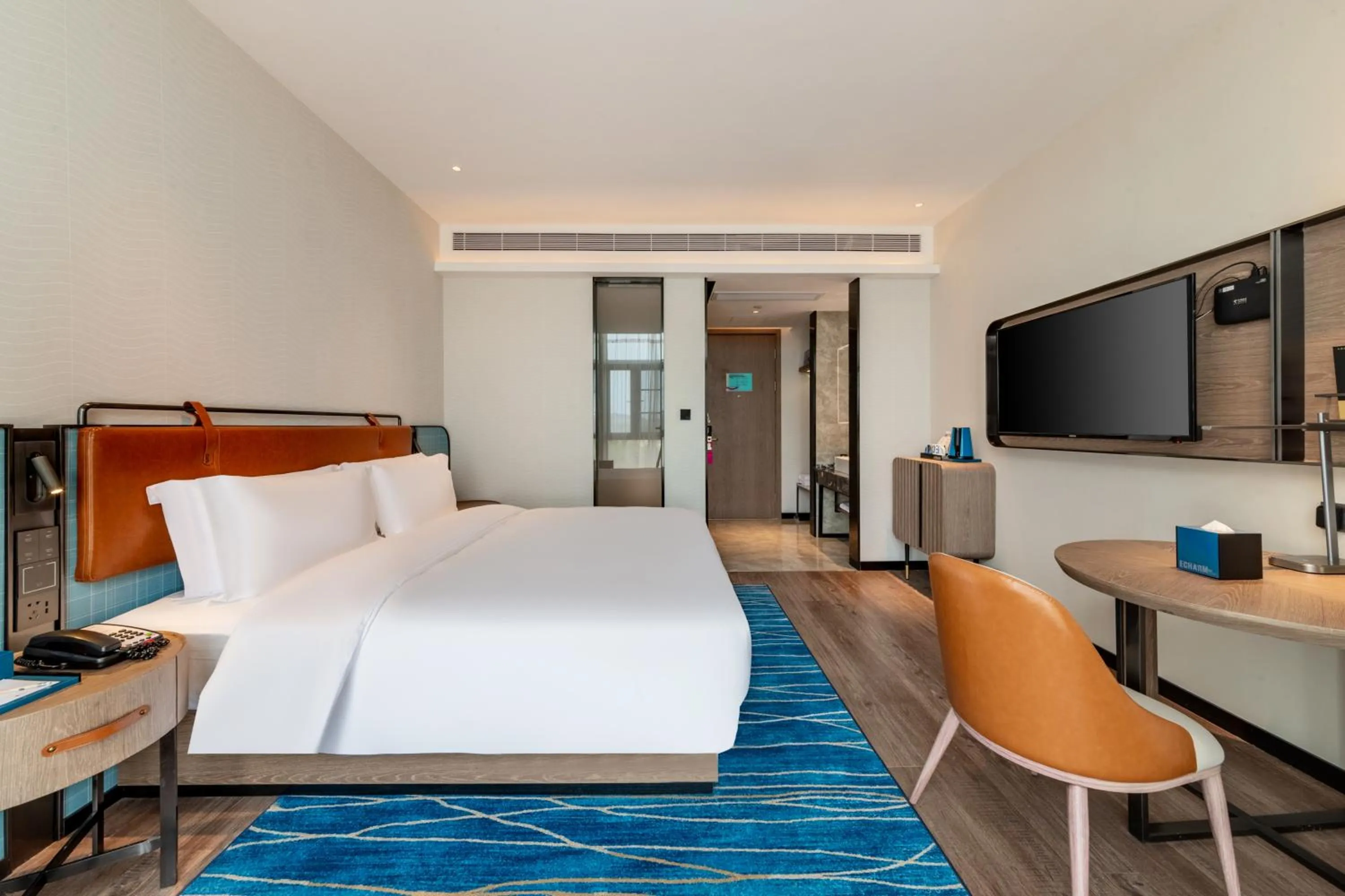 Bed in Echarm Hotel Yichang East Railway Station