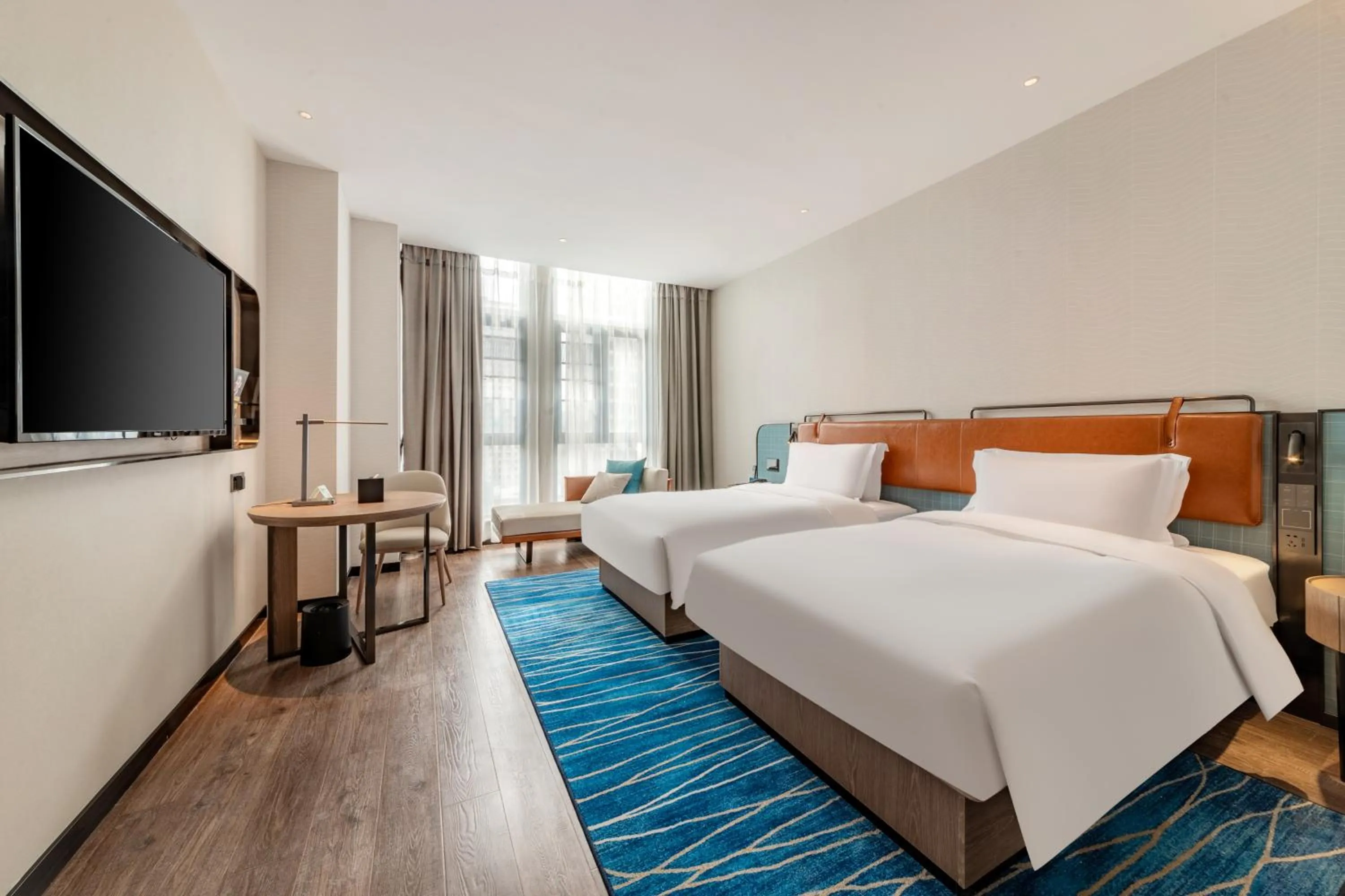 Photo of the whole room, Bed in Echarm Hotel Yichang East Railway Station