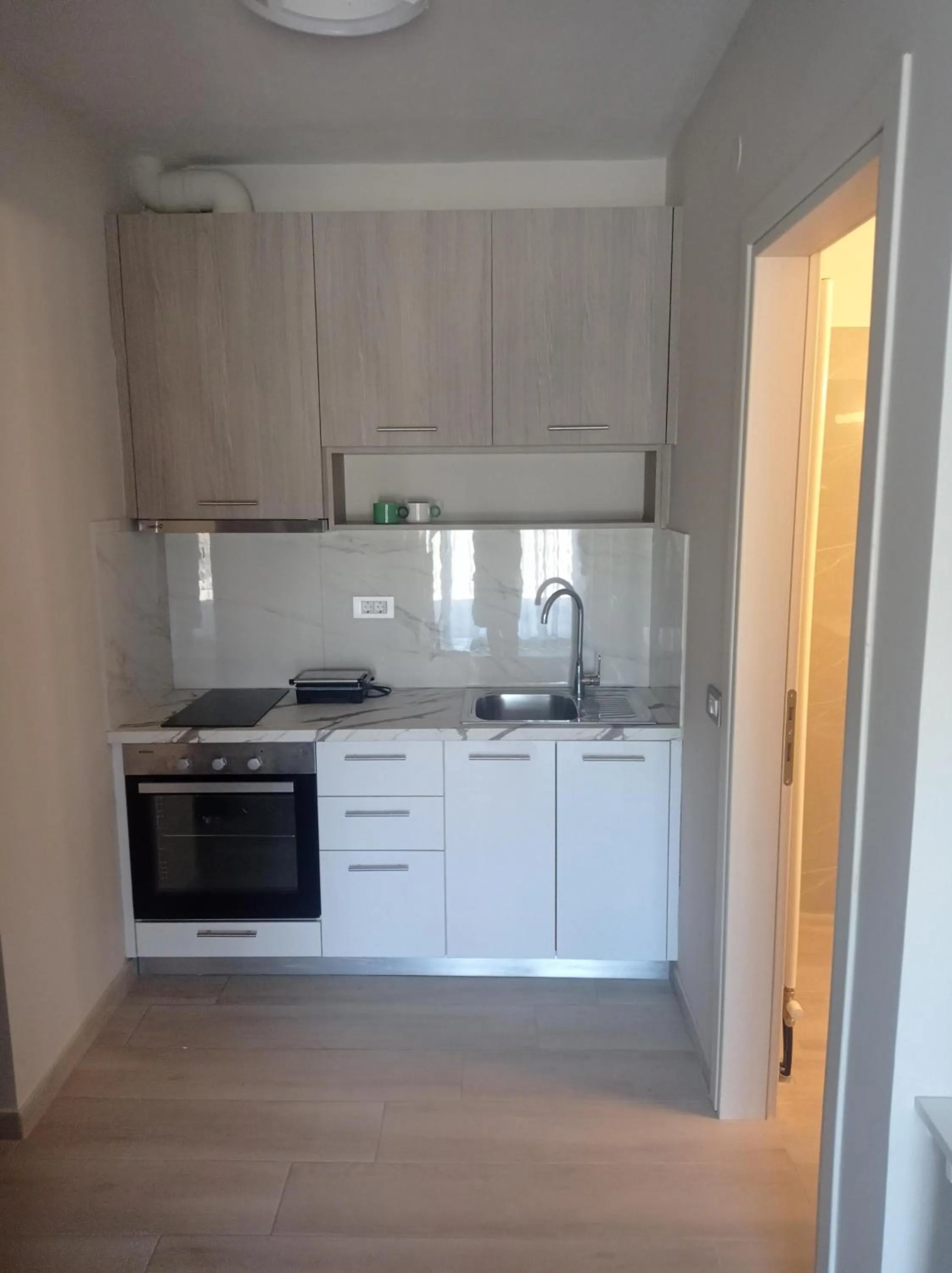 Kitchen or kitchenette in AK Apartments Ioa