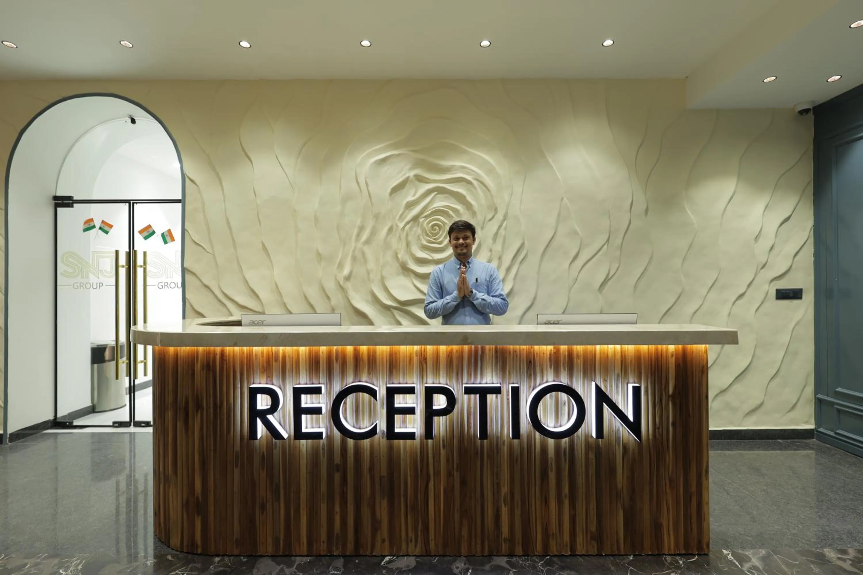 Lobby or reception in SNJ Taj Grand